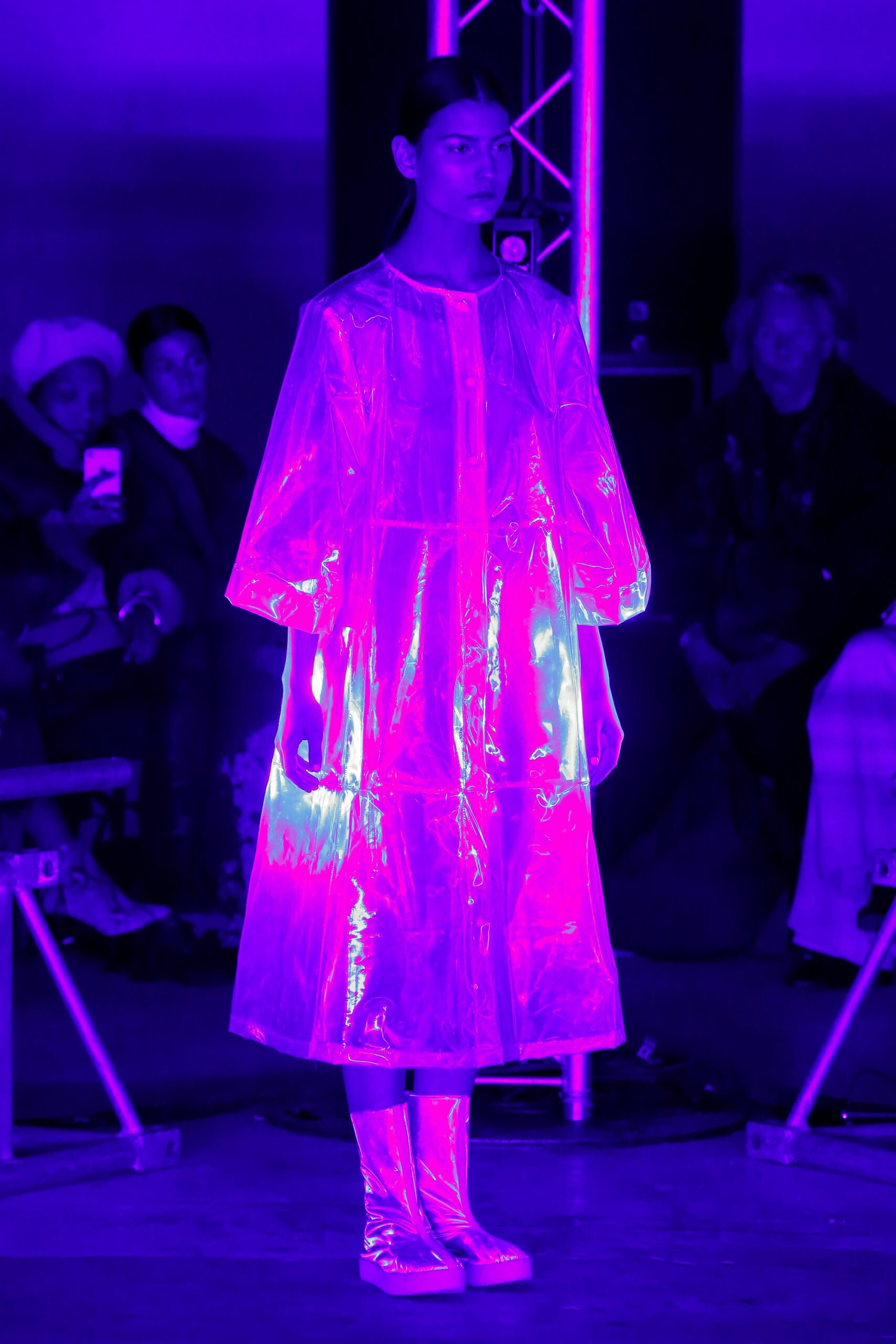 clear vinyl midi coat with white boots
