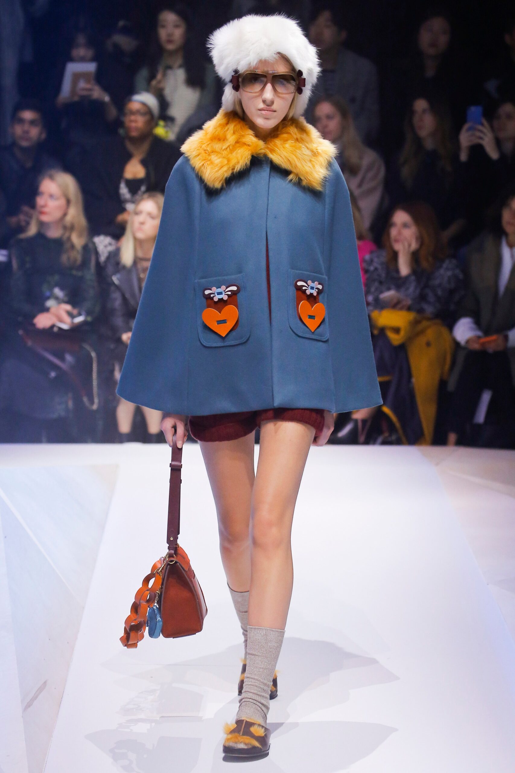 blue wool cape with orange details