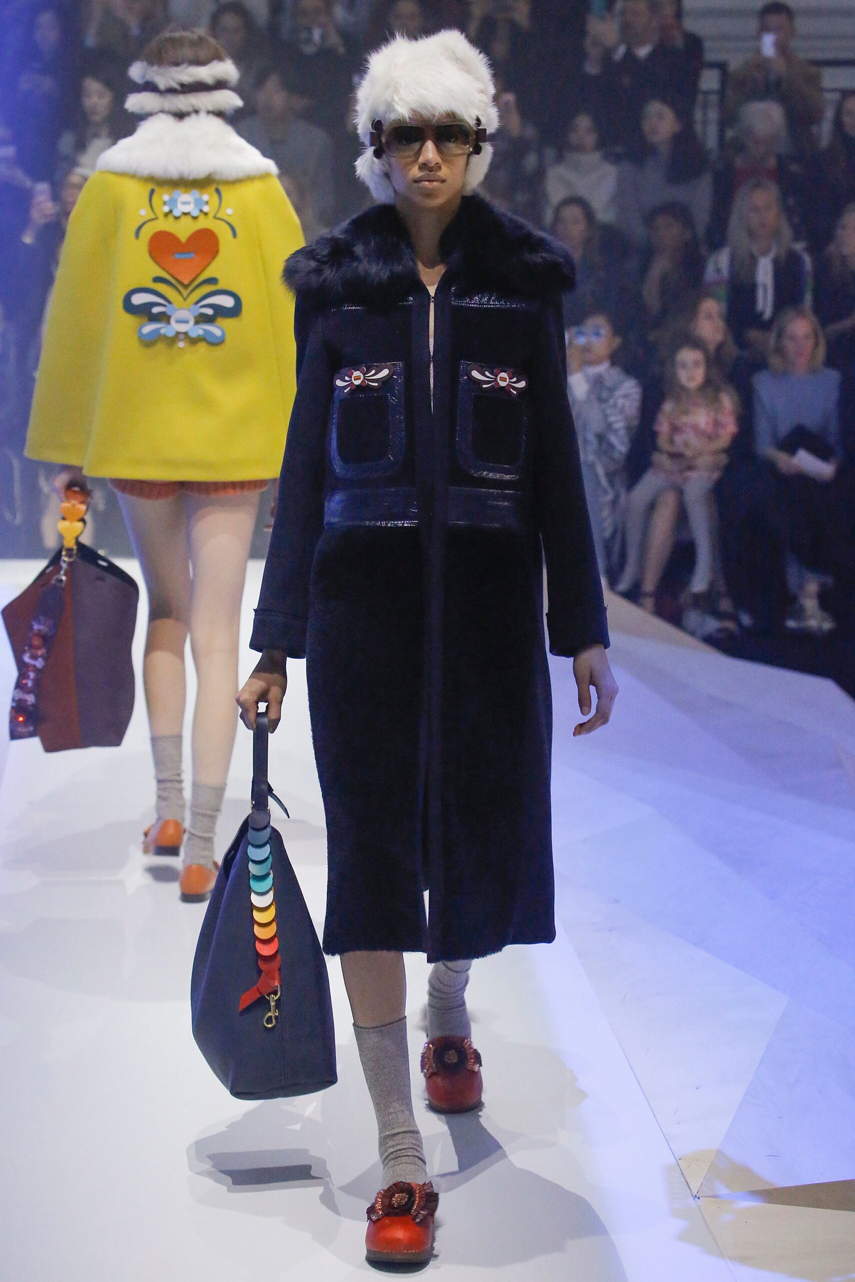 black fur long-sleeve collared fitted pockets buttoned coat