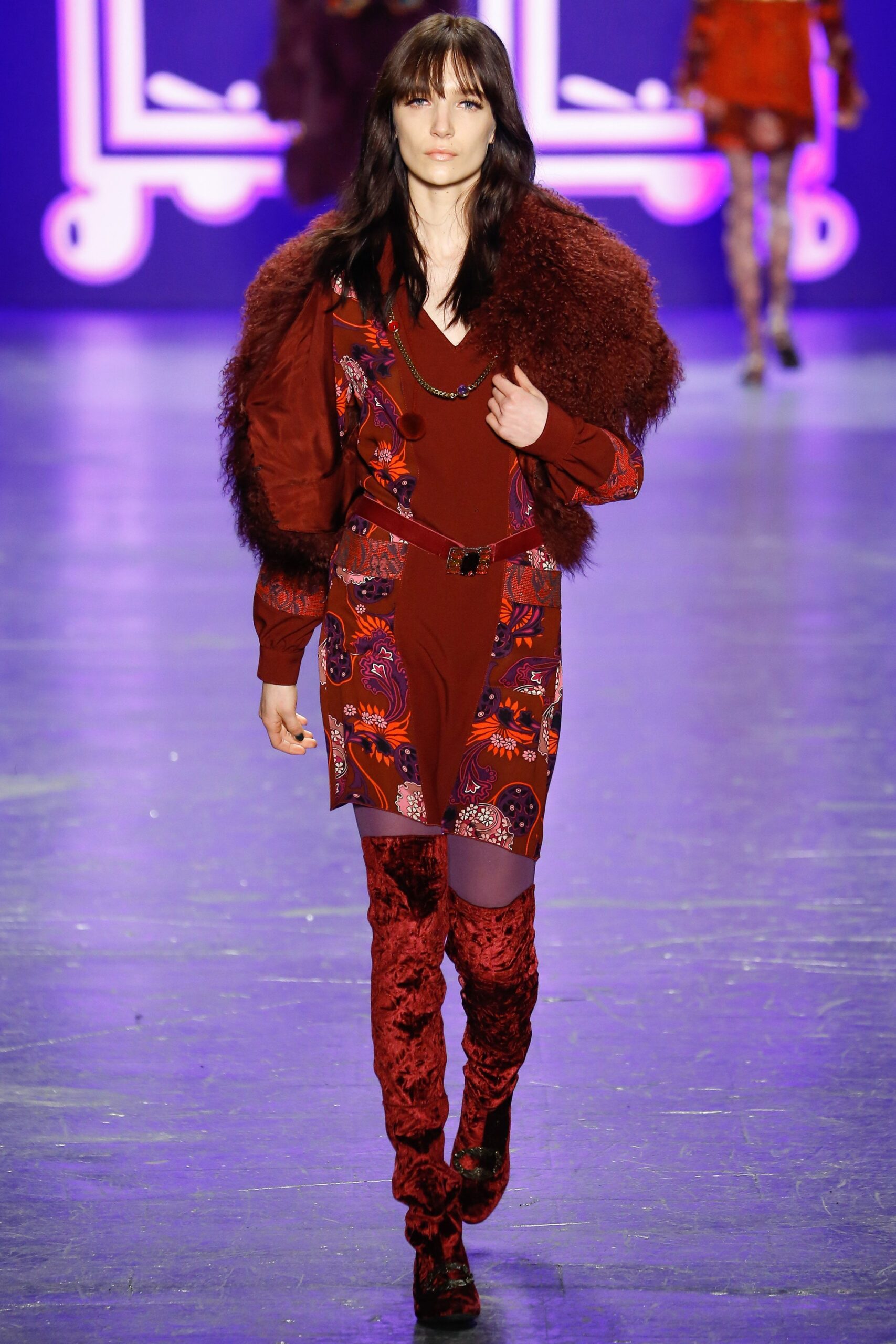 red silk mini dress with brown fur cape