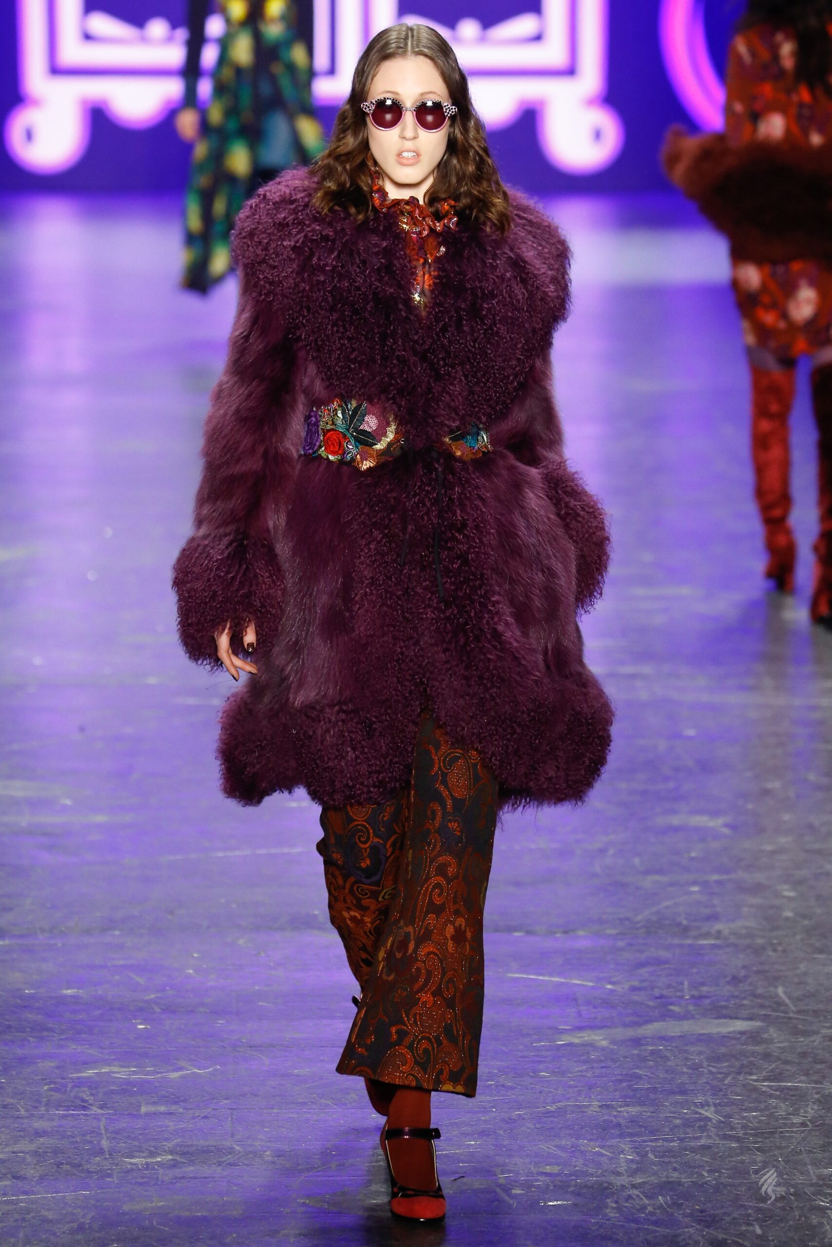 purple fur coat with flared pants