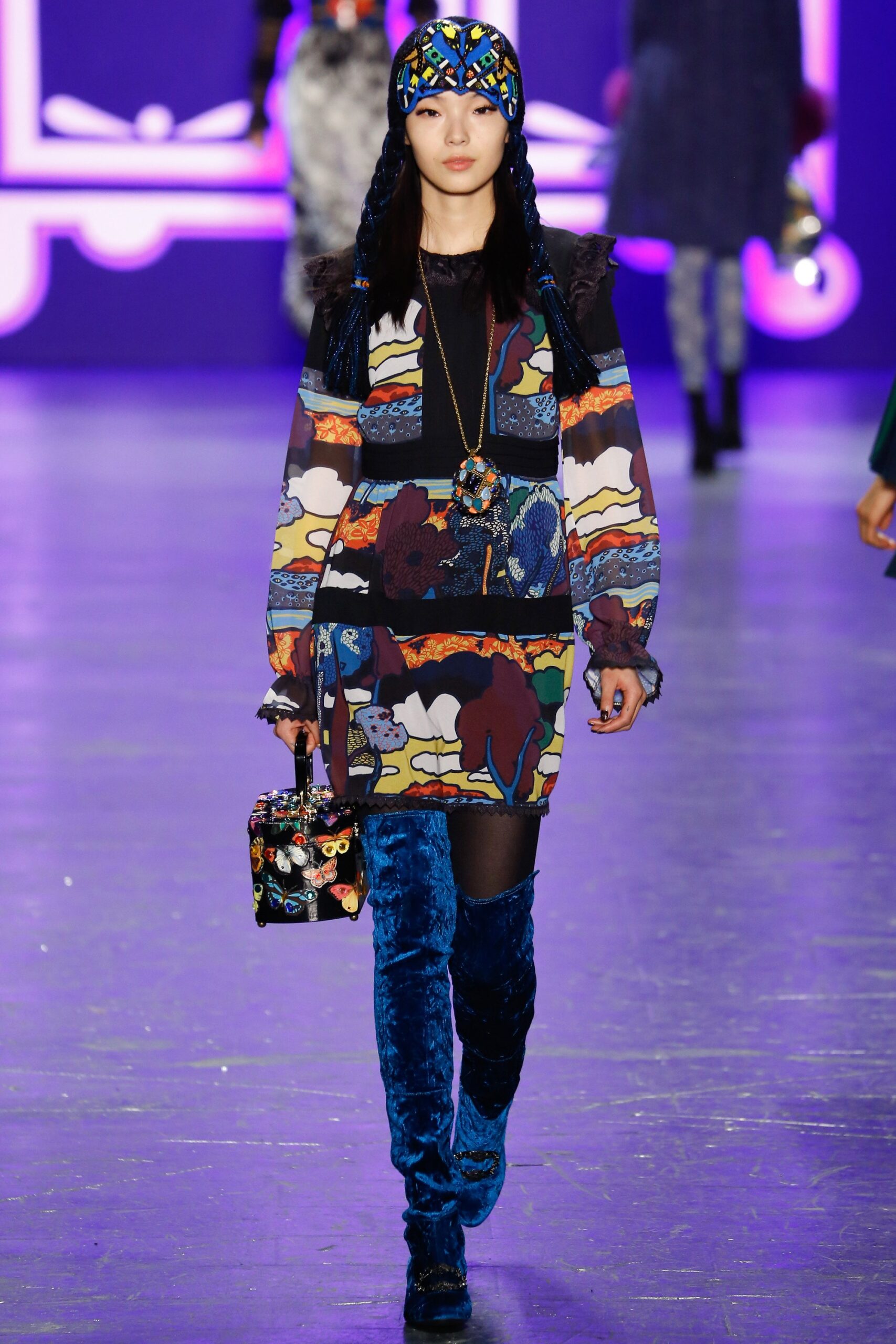 multi-colored printed dress with blue boots
