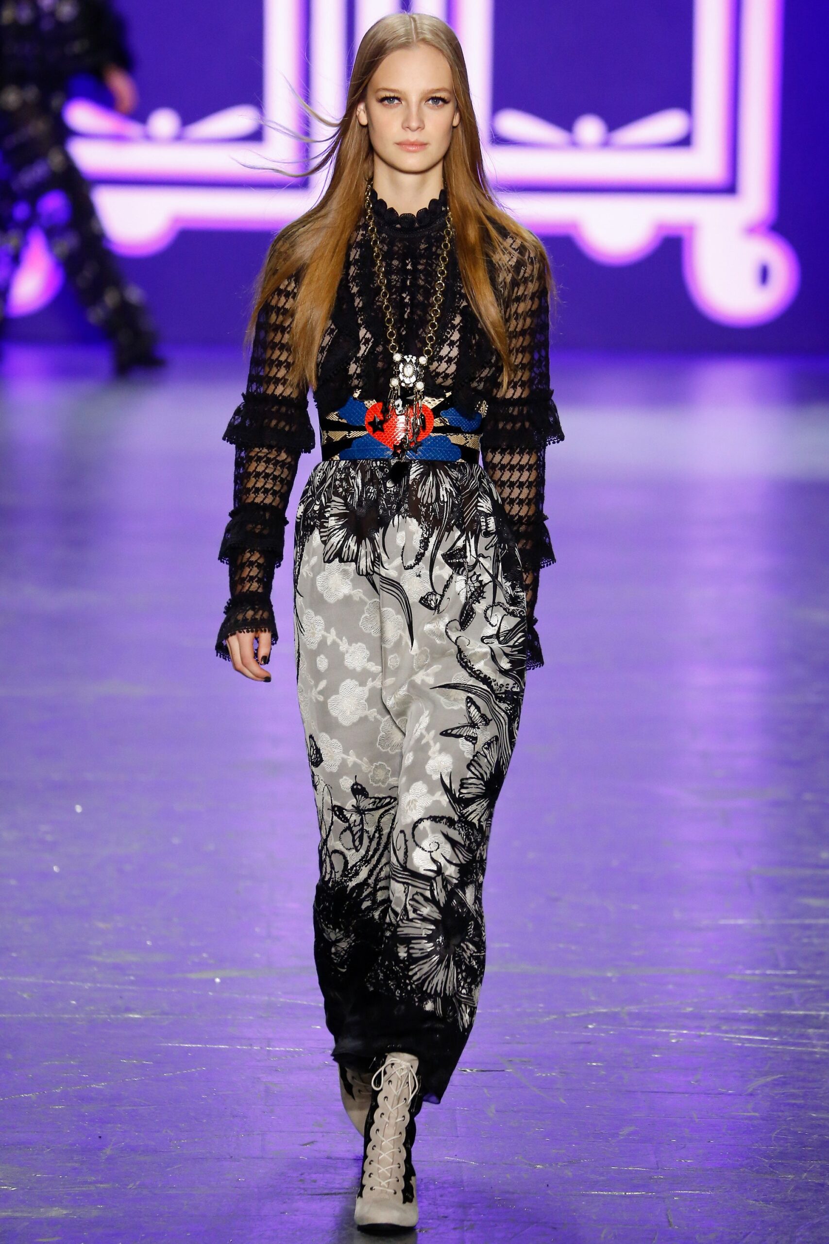 black lace blouse with flared pants
