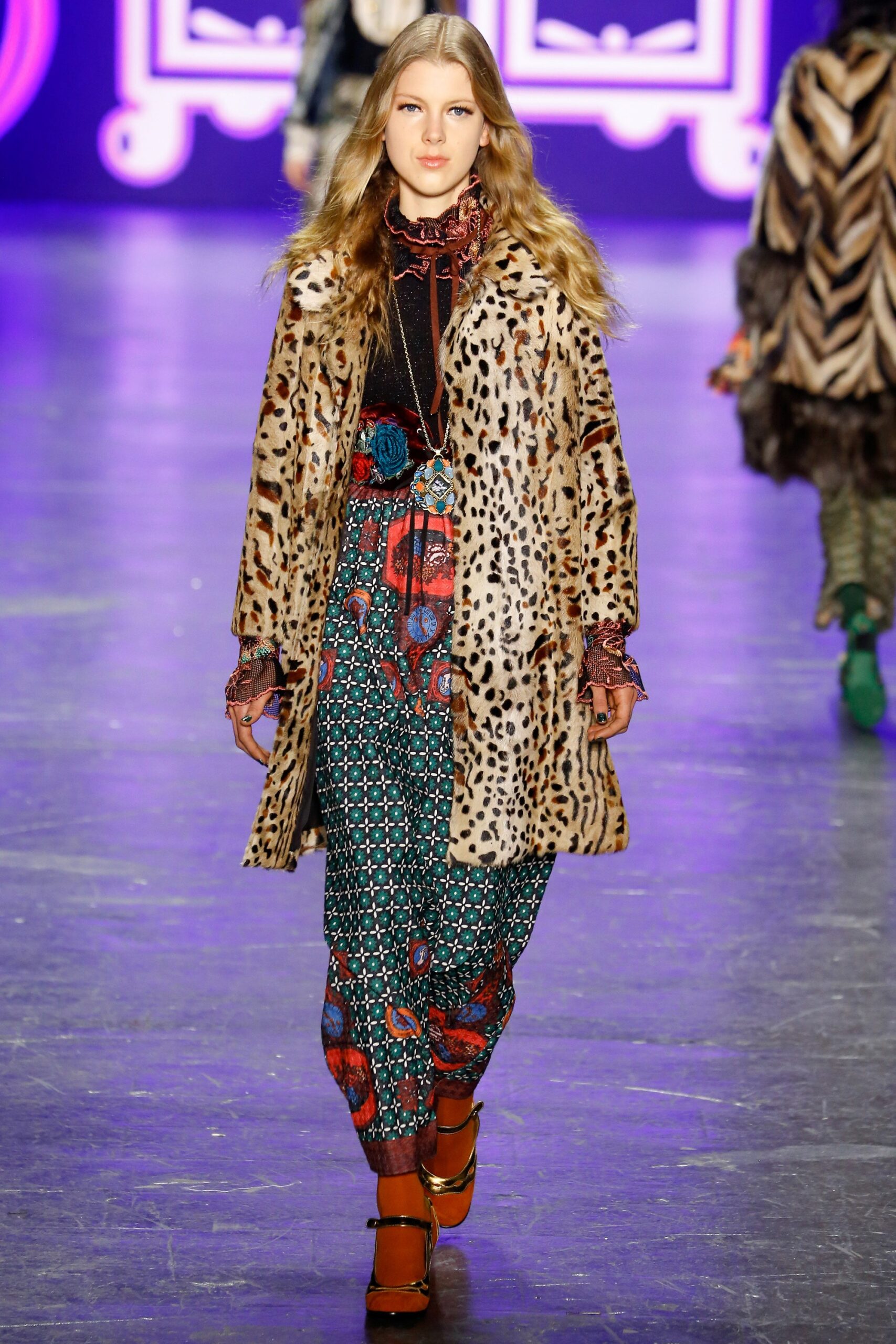 brown fur coat with printed pants