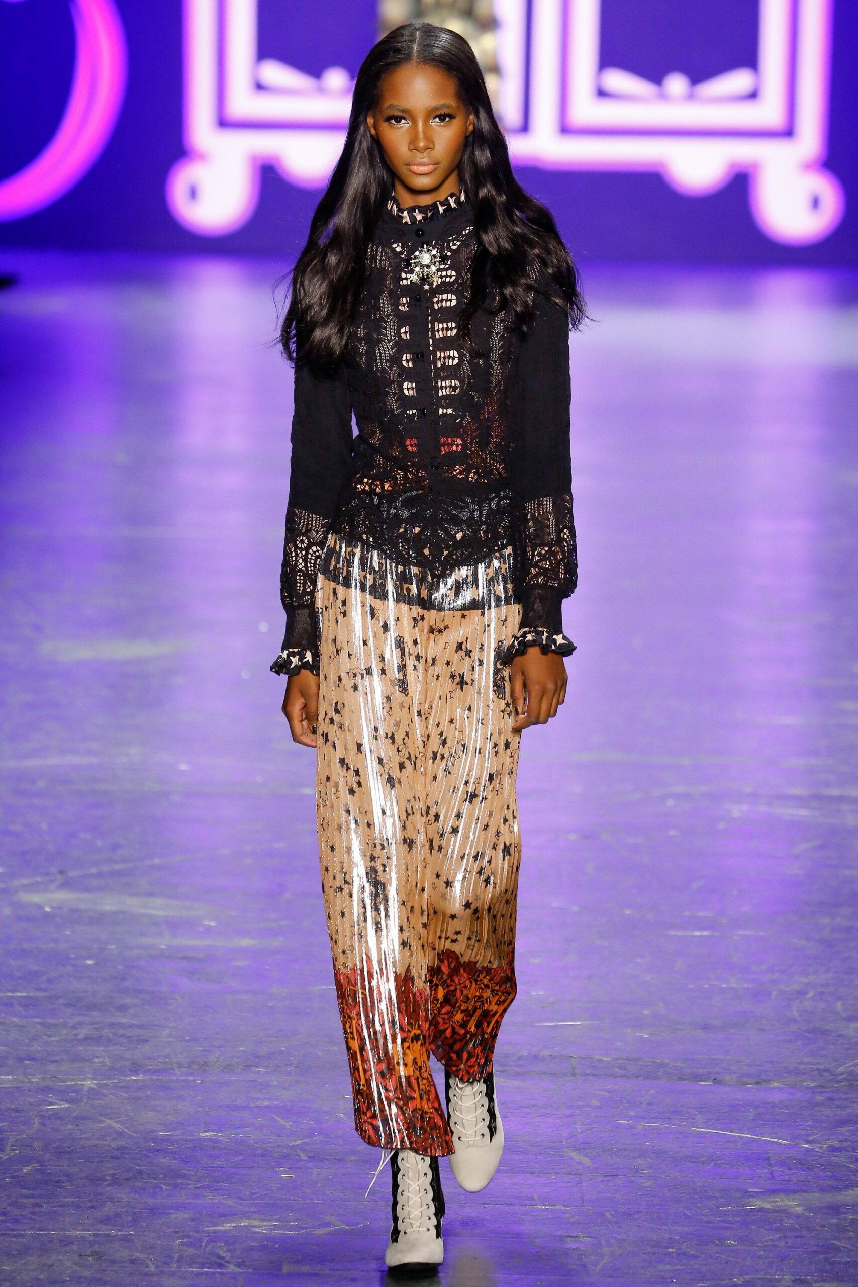 black embroidered blouse with multi pants
