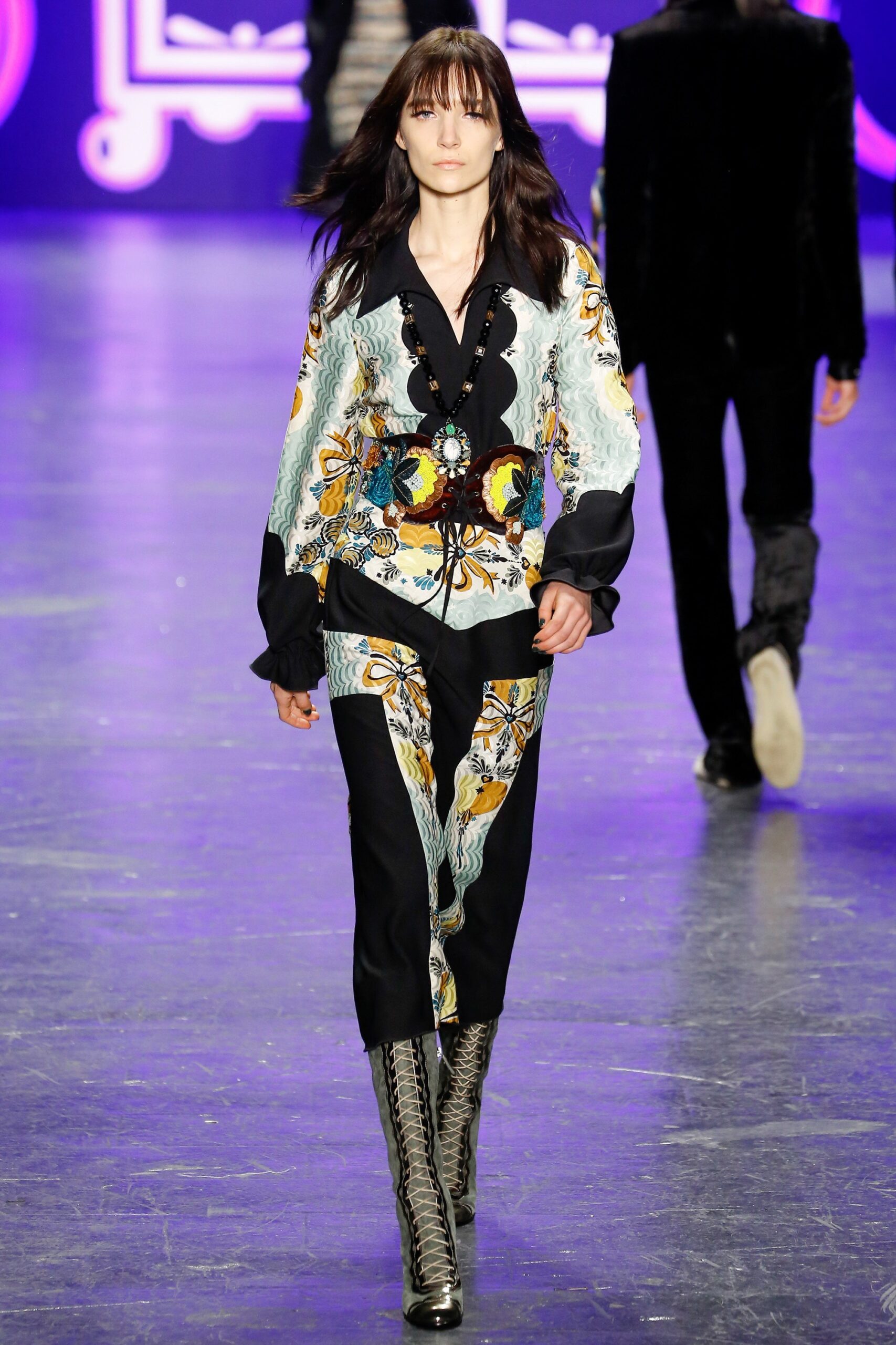 fitted blue silk shirt with black pants