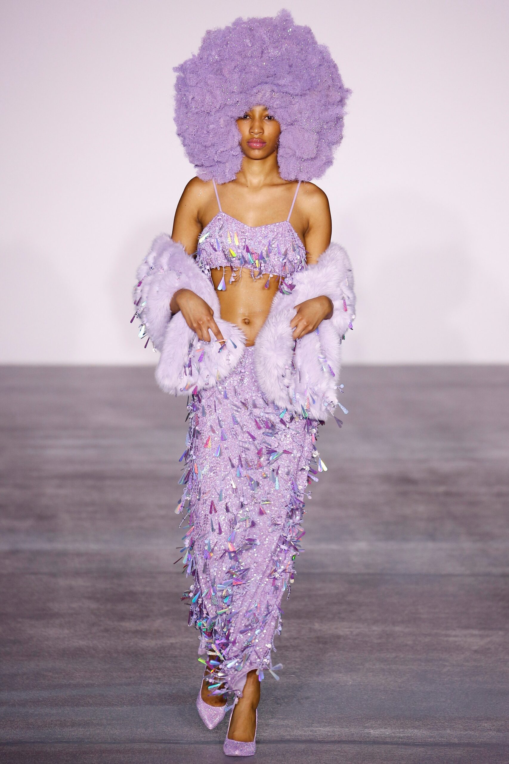 purple beaded top and skirt