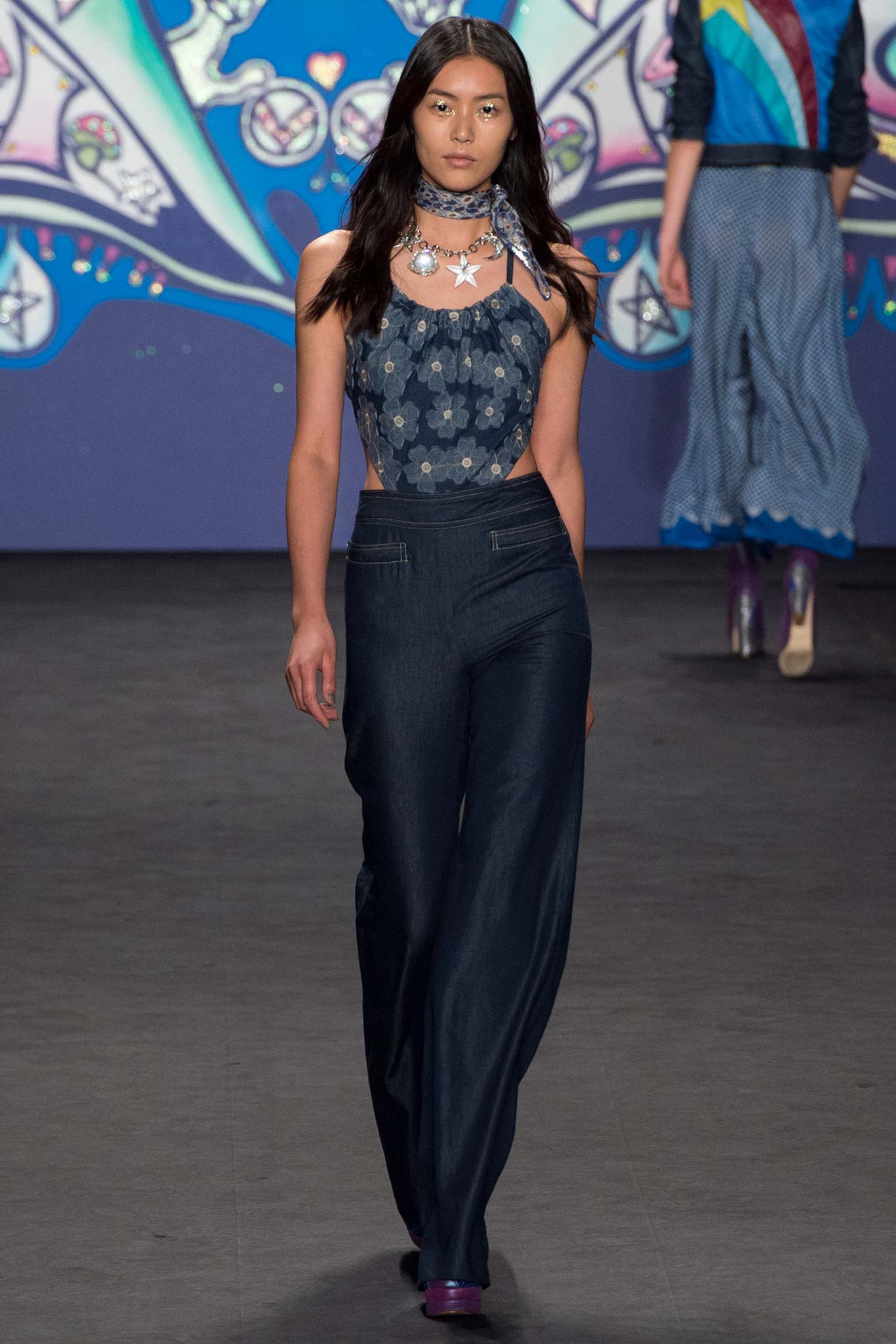 blue denim sleeveless top and wide-leg pants