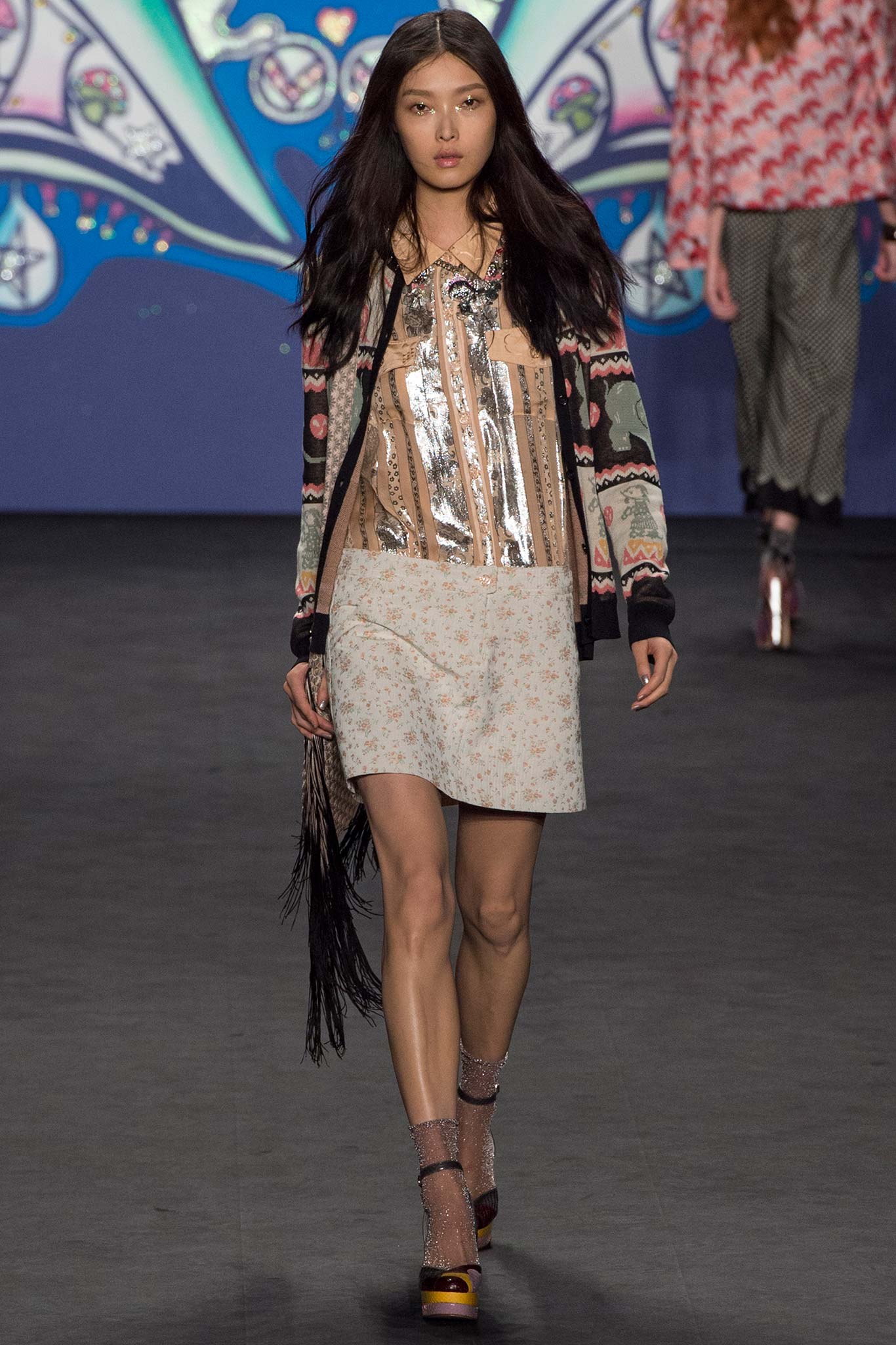 beige silk top with black cardigan