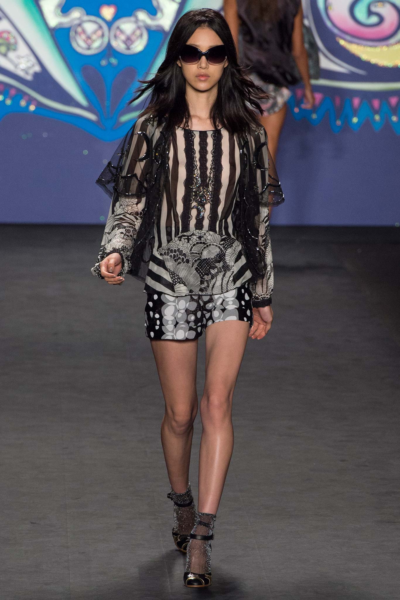 black and white ruffled blouse with shorts