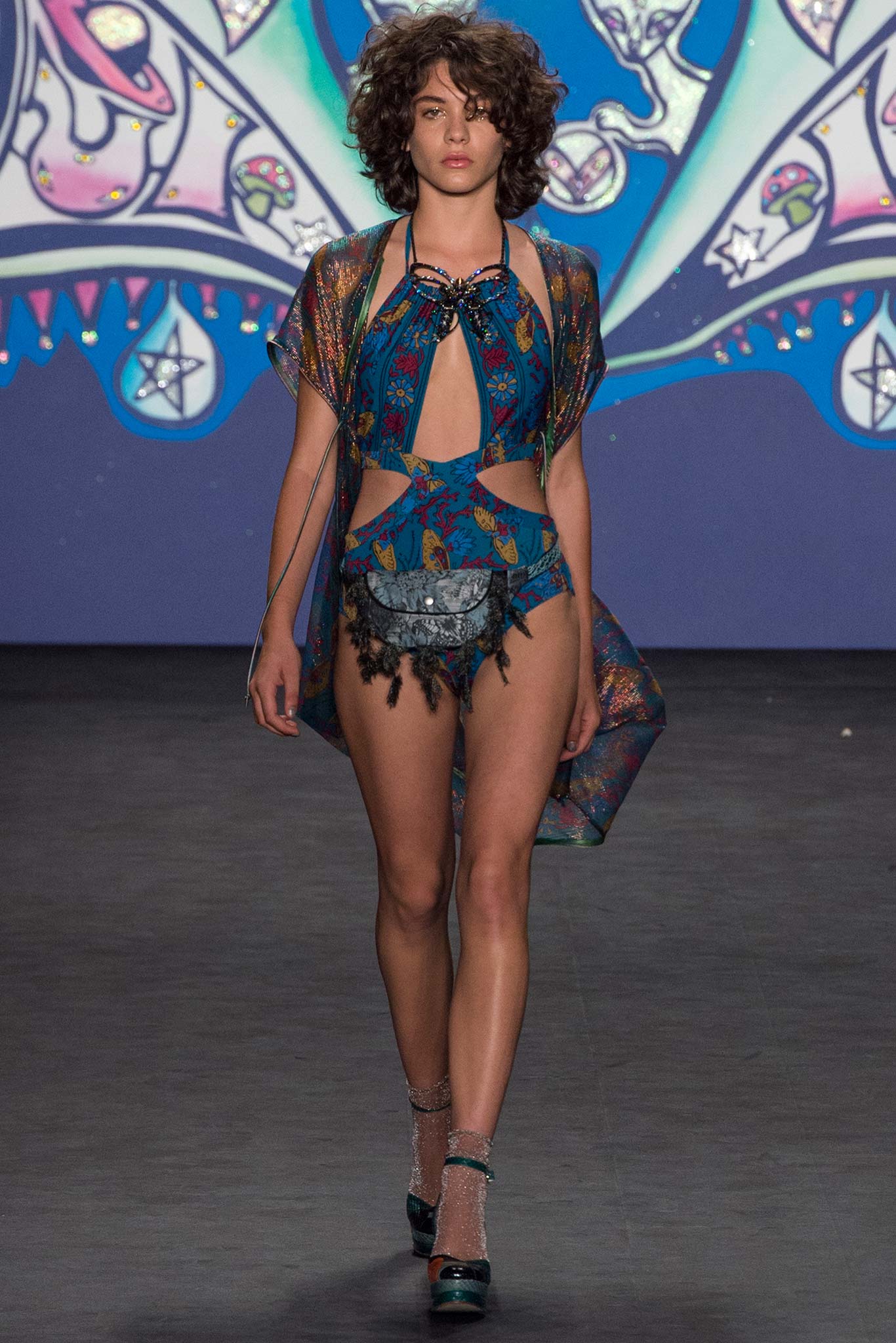 blue green printed swimsuit with cape