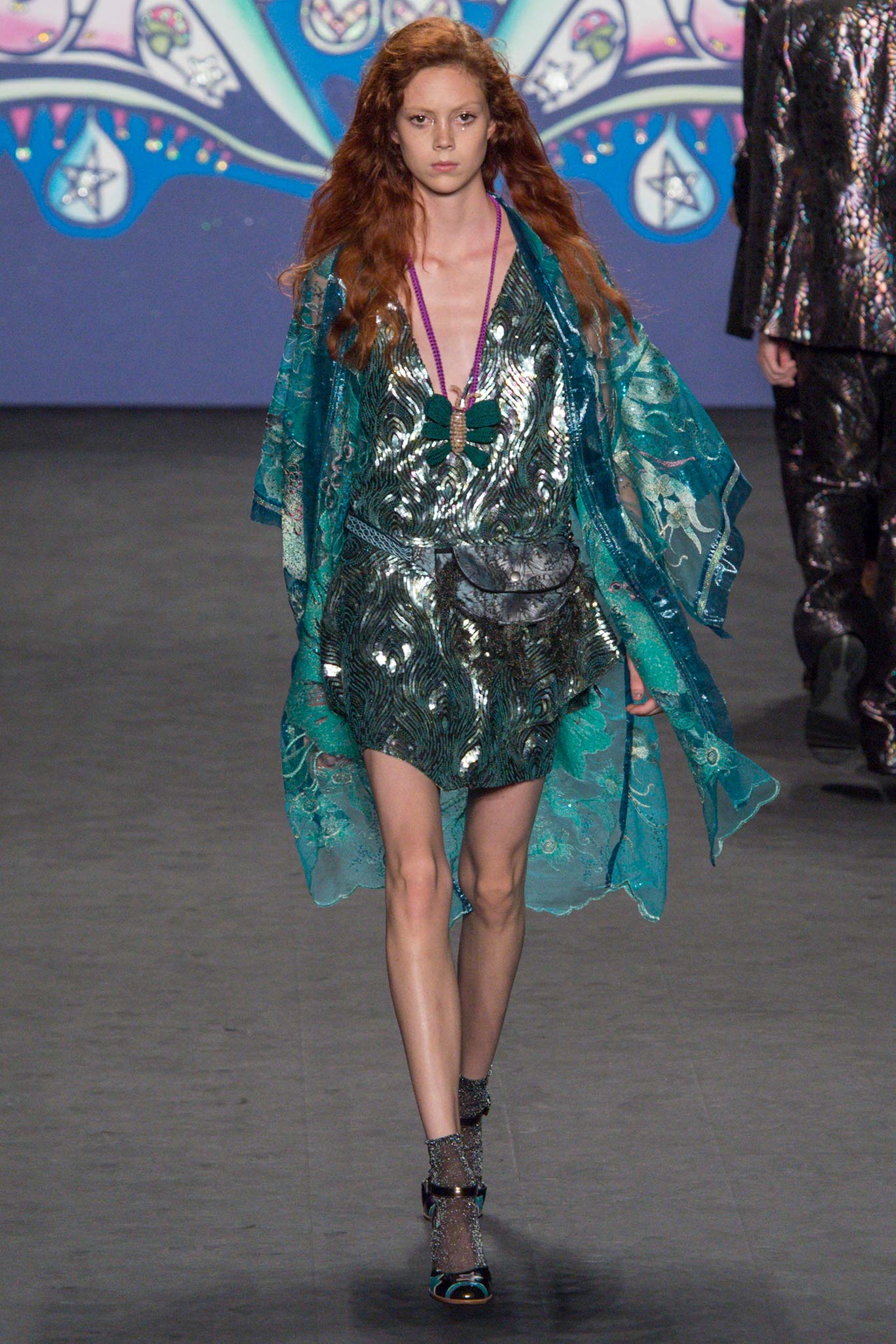 green silk mini dress with blue cape