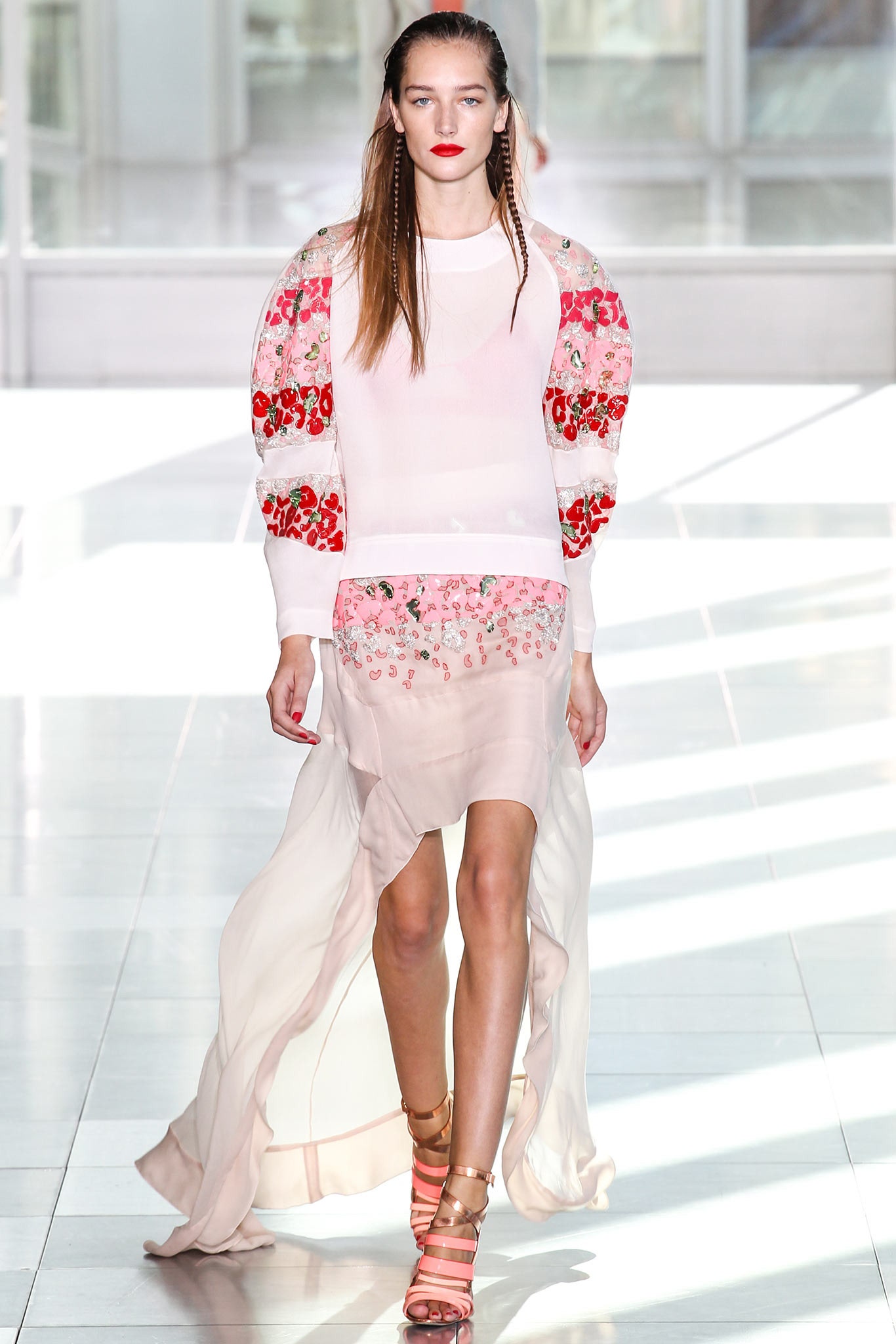 pink embroidered top with beige skirt