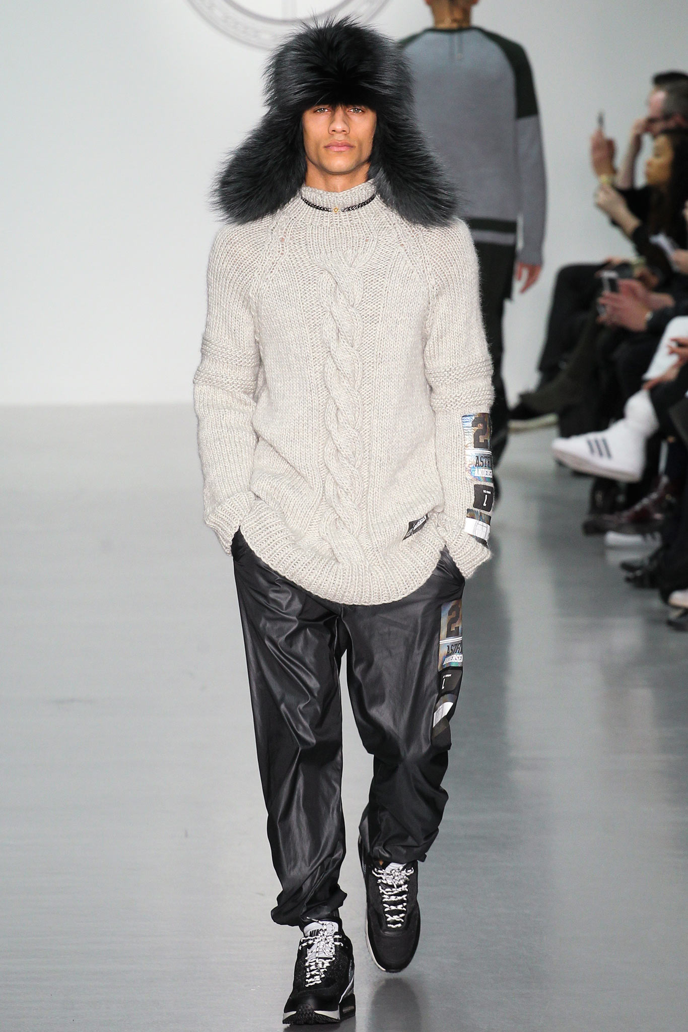 gray wool relaxed sweater with black pants