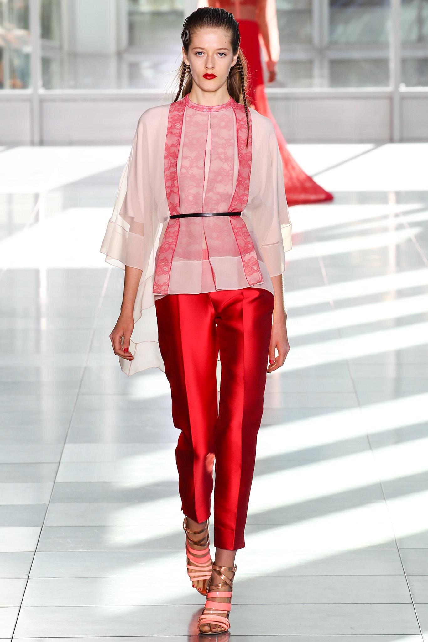 white pink layered top red pants