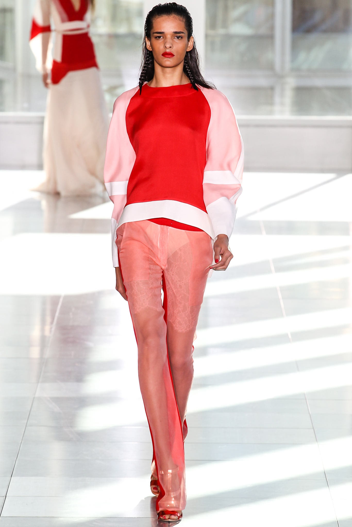 red and pink fitted top with sheer pants