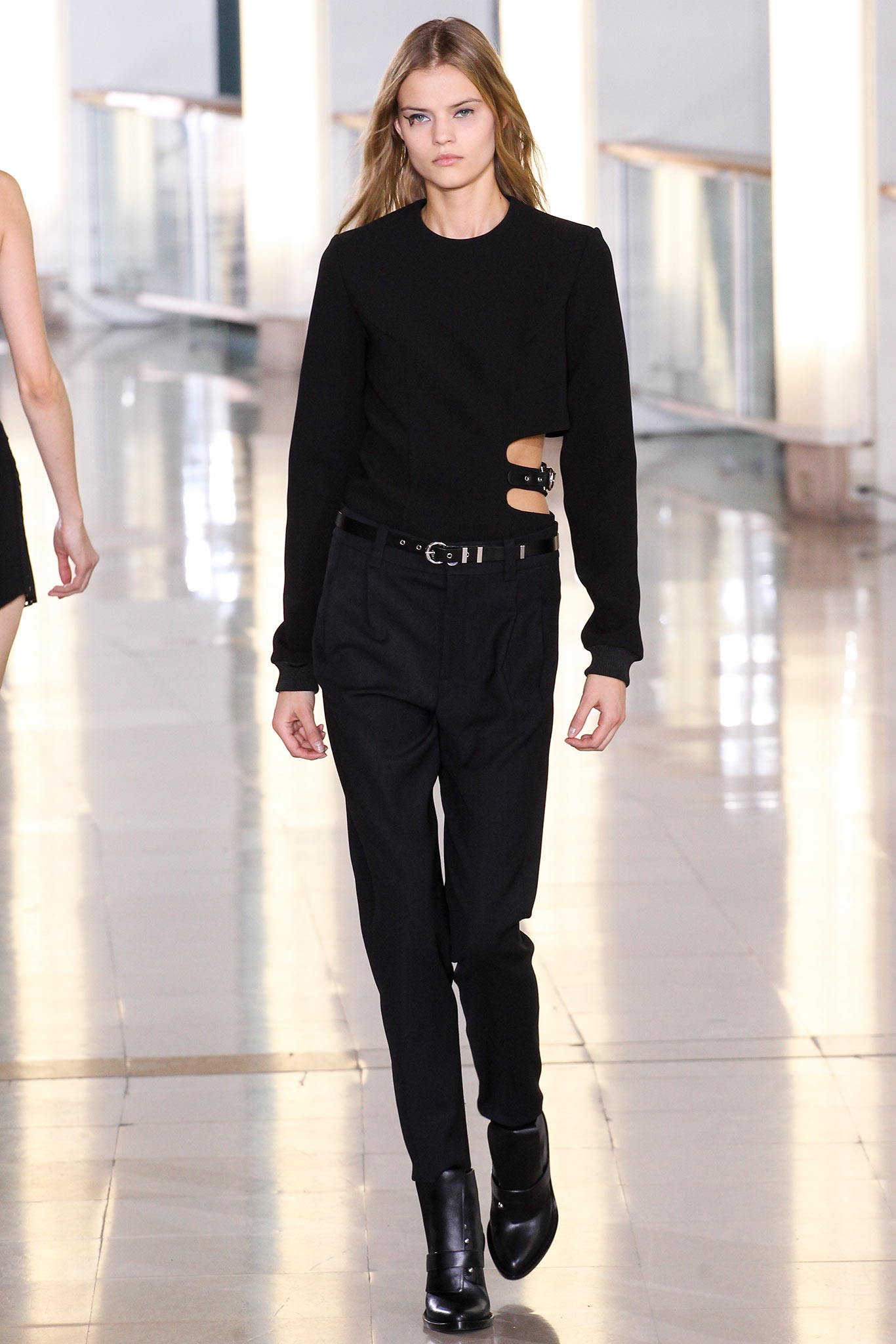 black fitted top and tailored pants