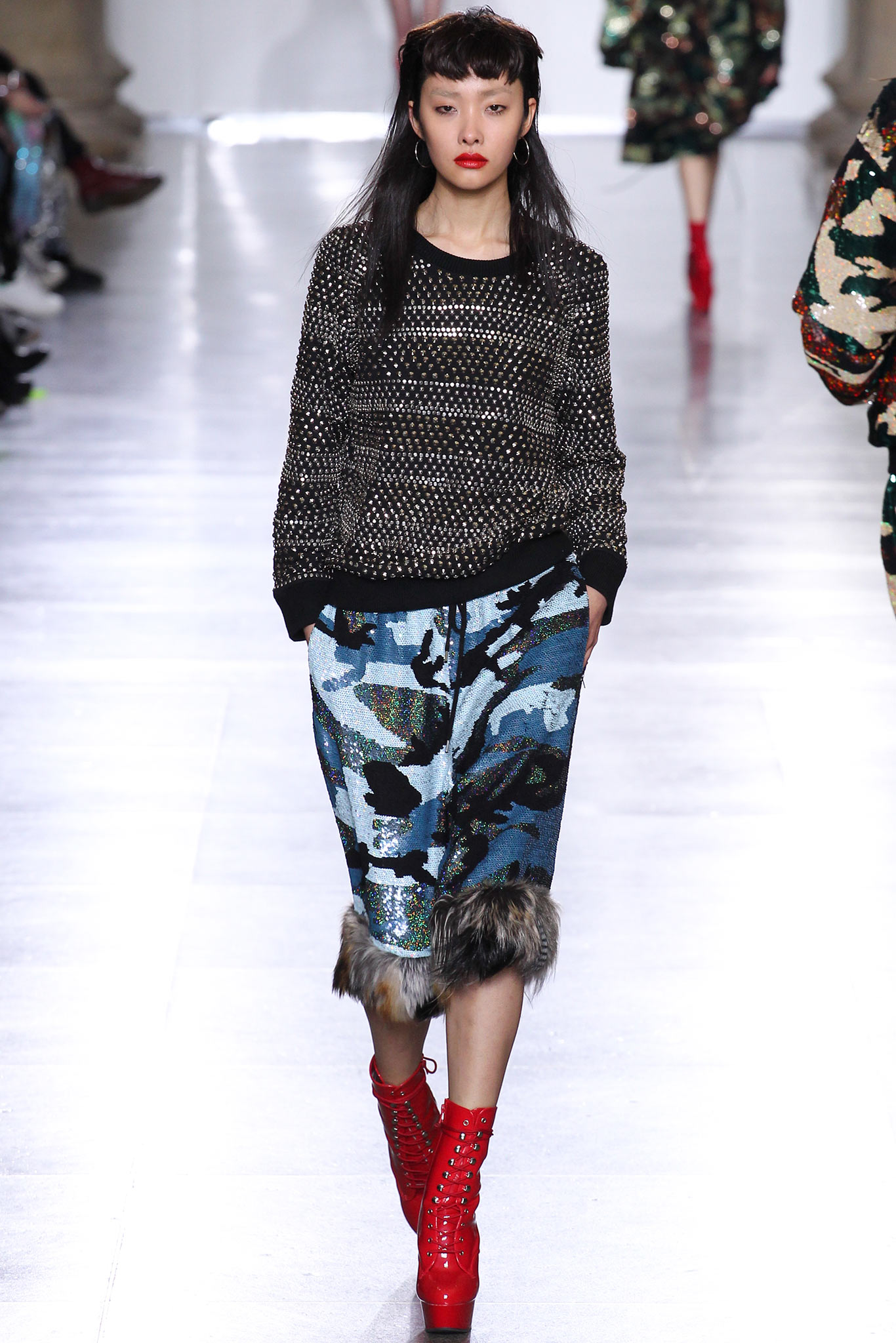 black wool sweater with camouflage skirt