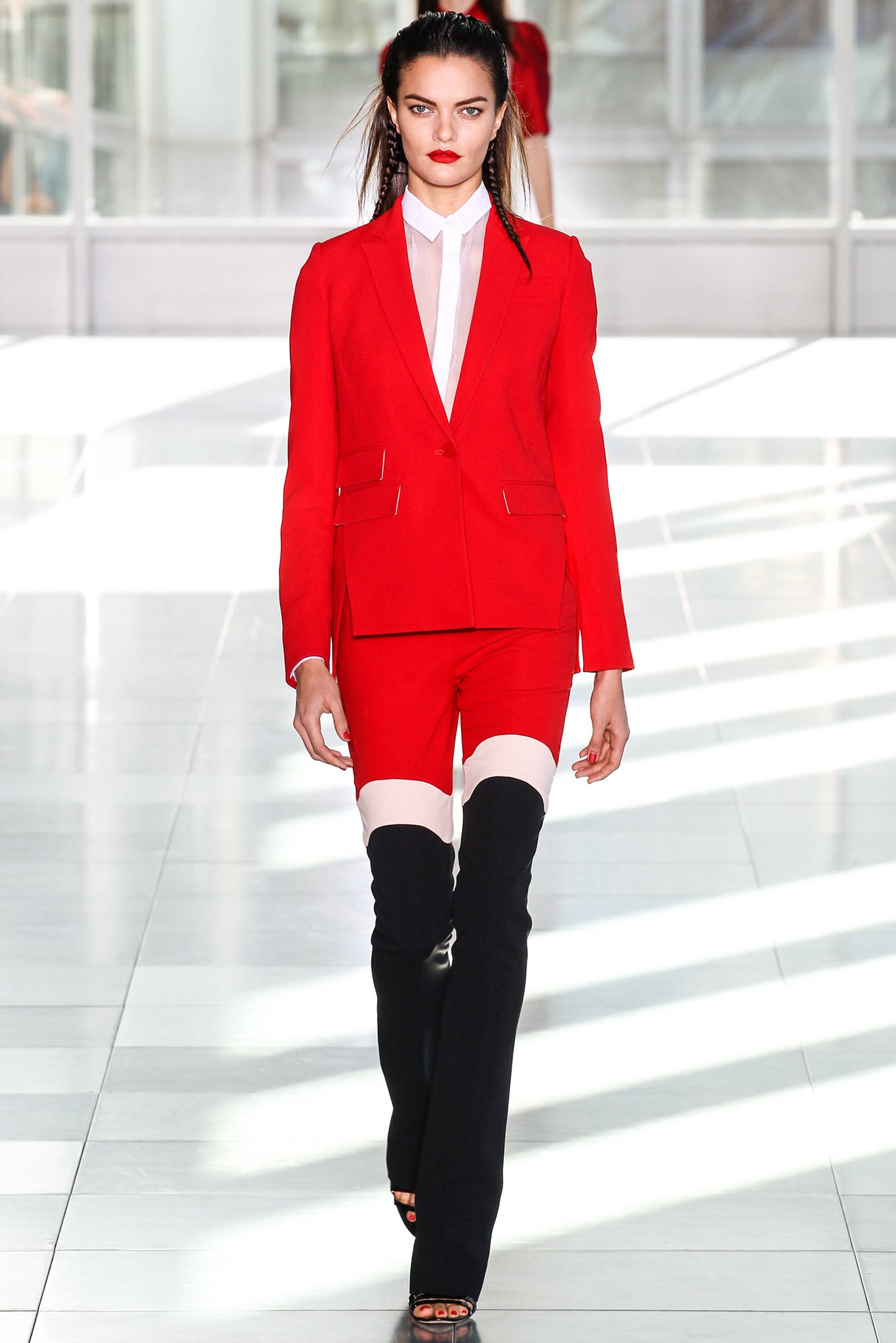 red tailored suit with black pants