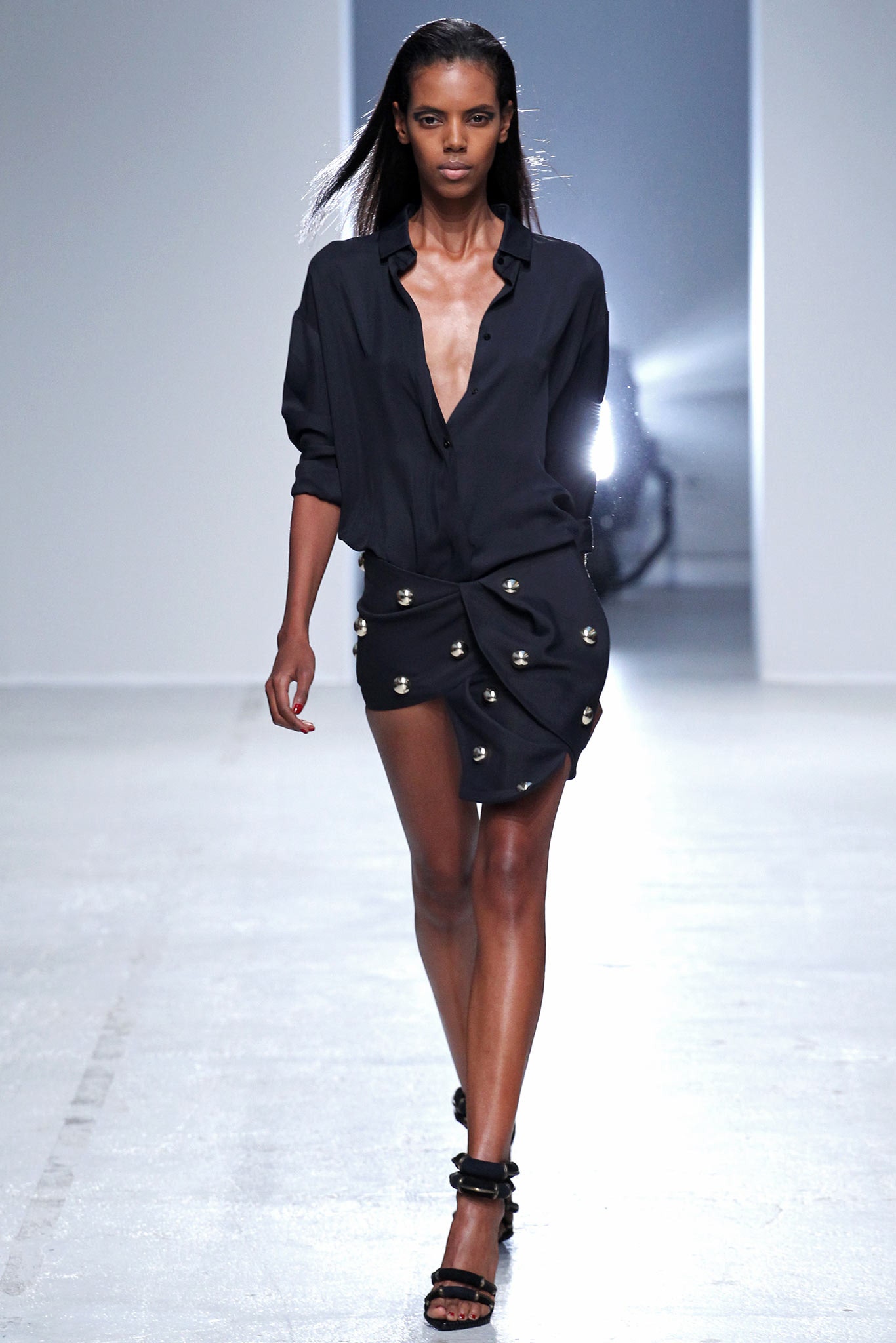 black relaxed shirt and fitted skirt