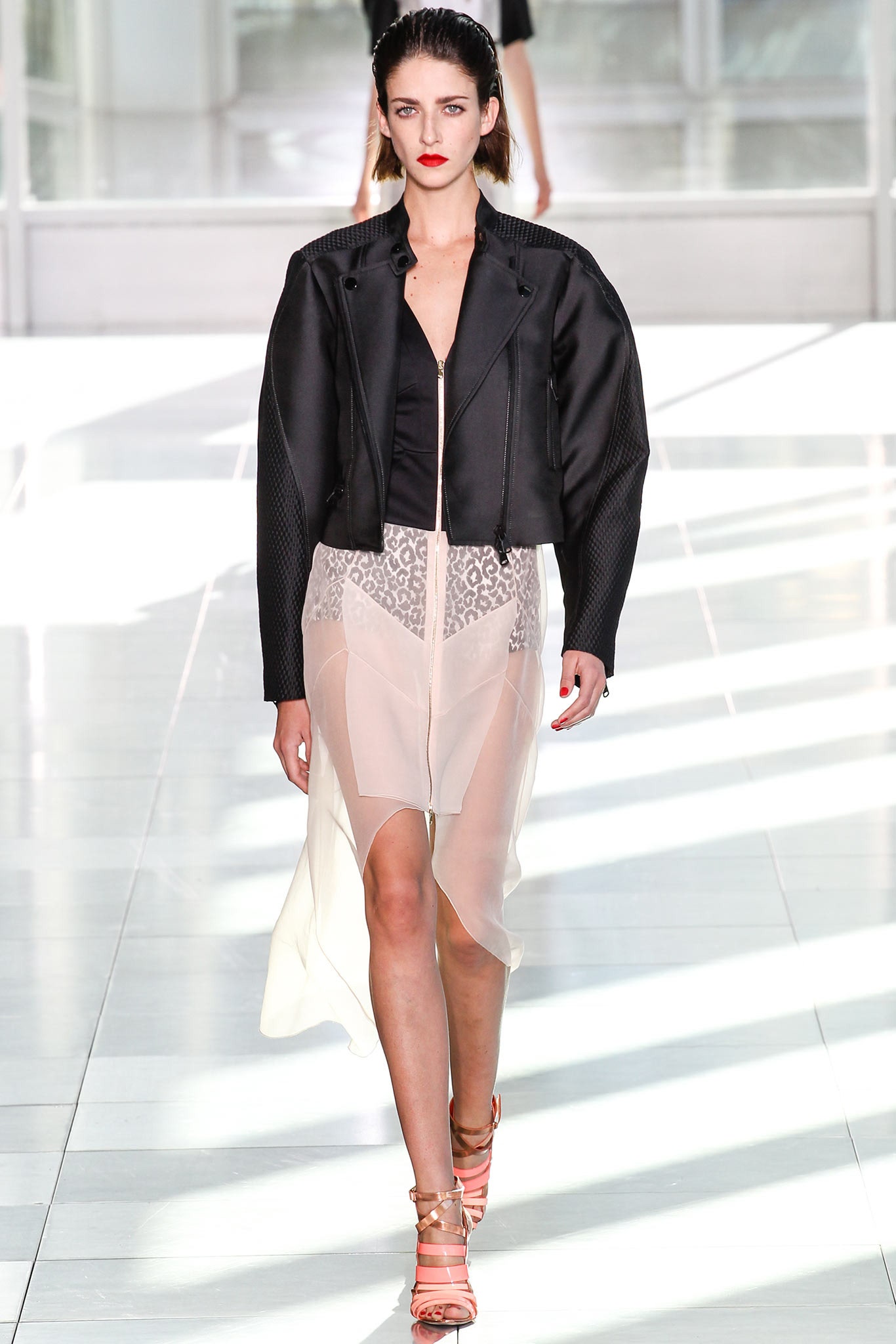 black leather fitted jacket and white chiffon dress