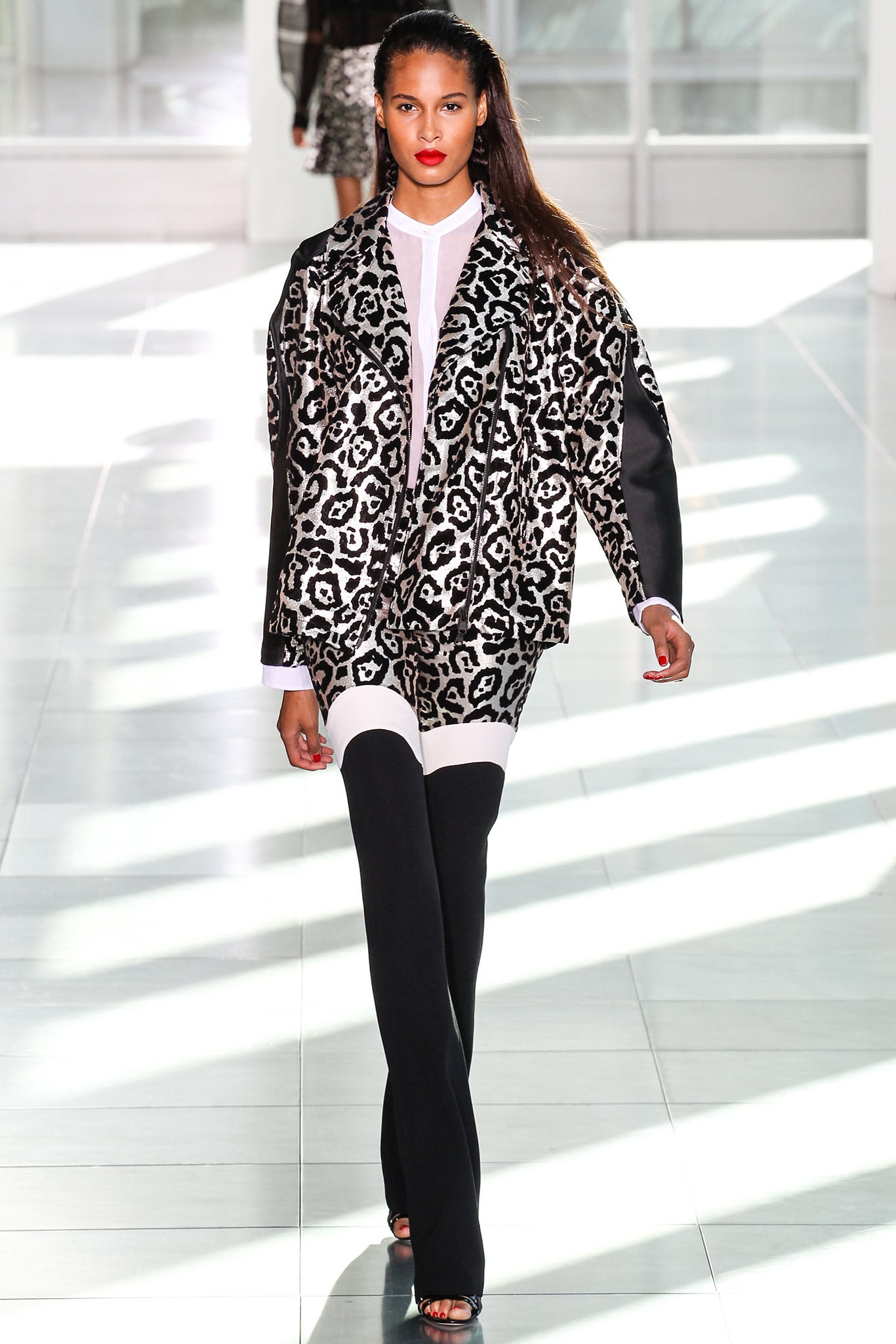 black and white animal-print jacket with fitted pants