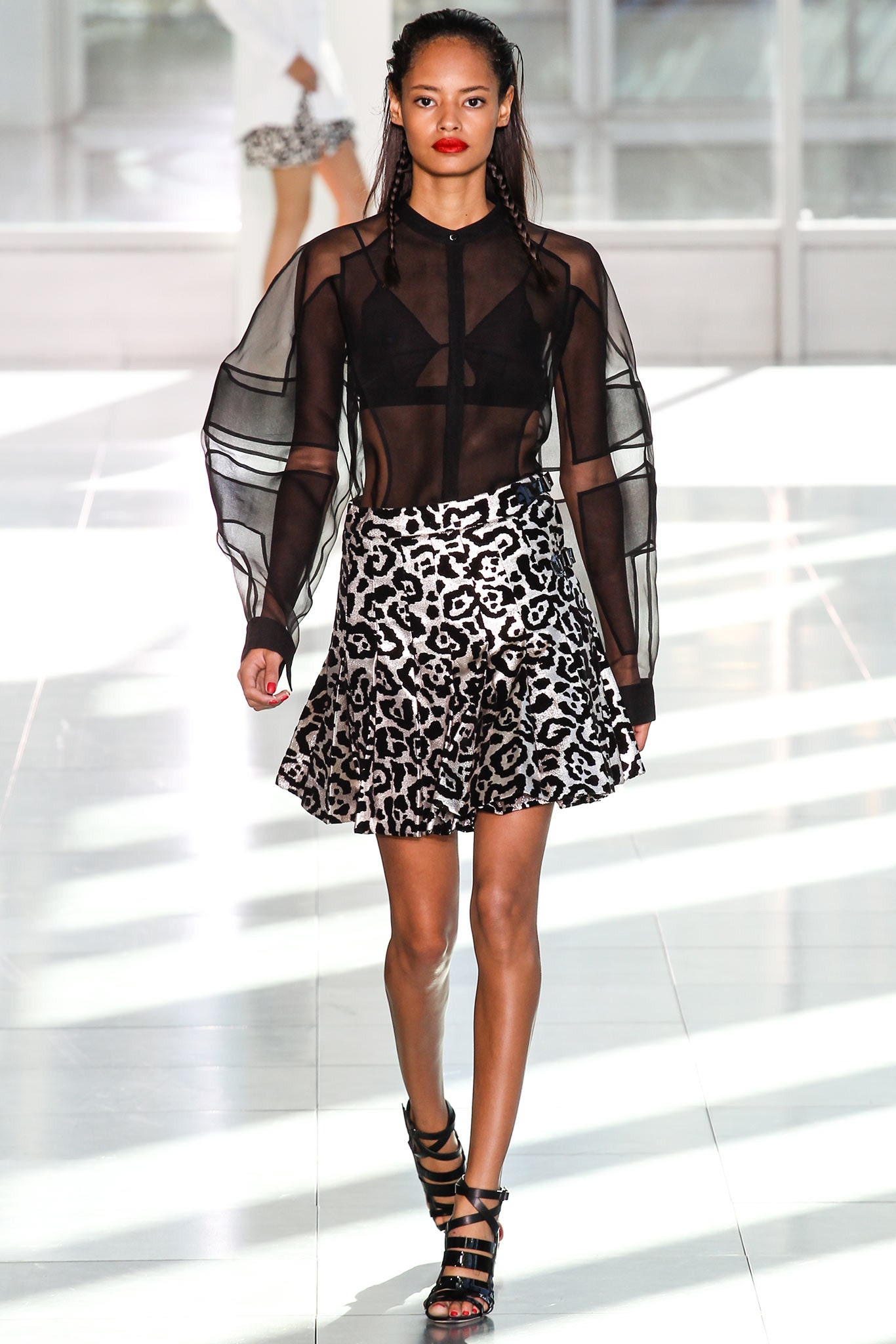 black sheer top with flared skirt