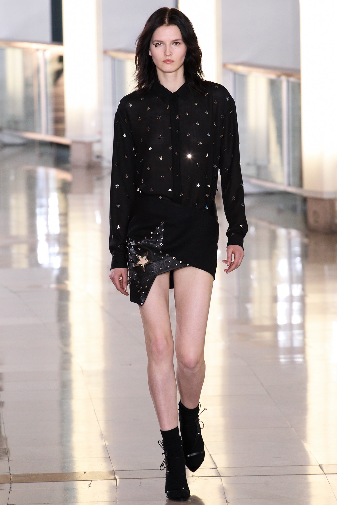 black embellished shirt and asymmetric skirt