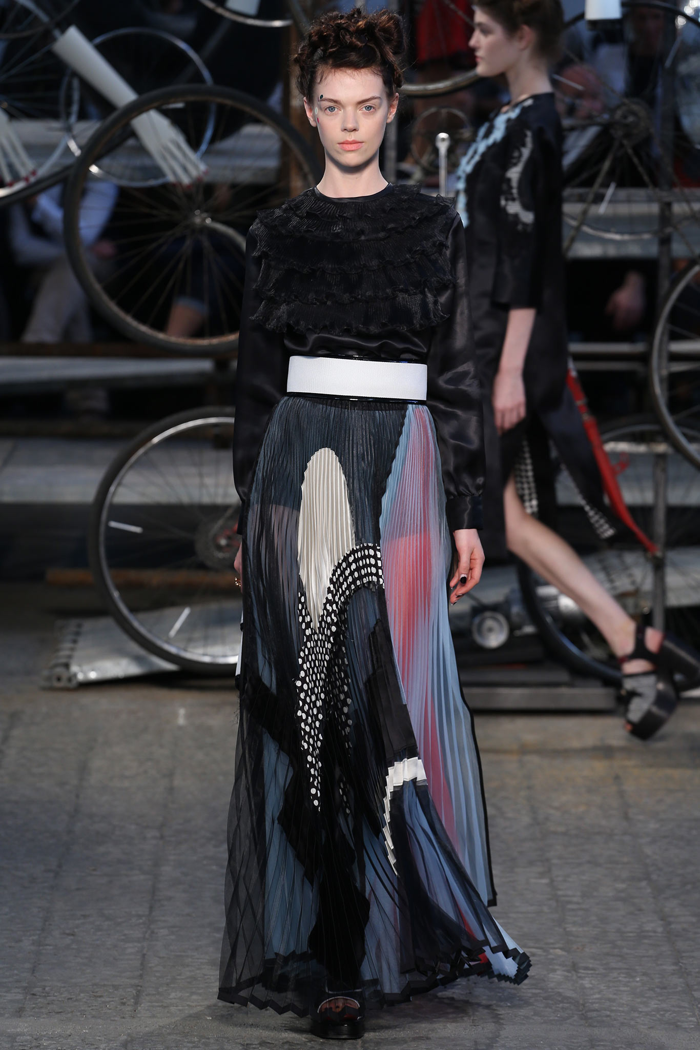 black silk blouse with pleated skirt