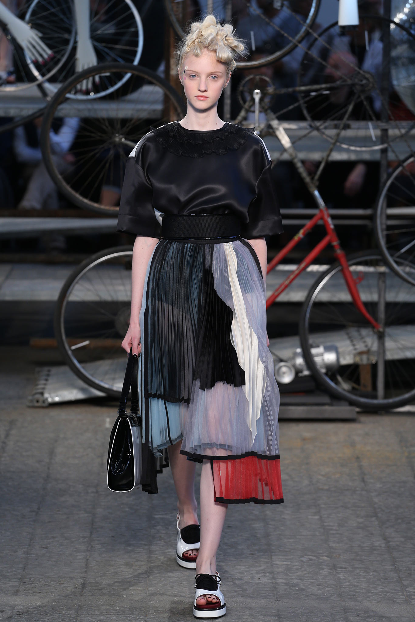 black silk top with pleated skirt