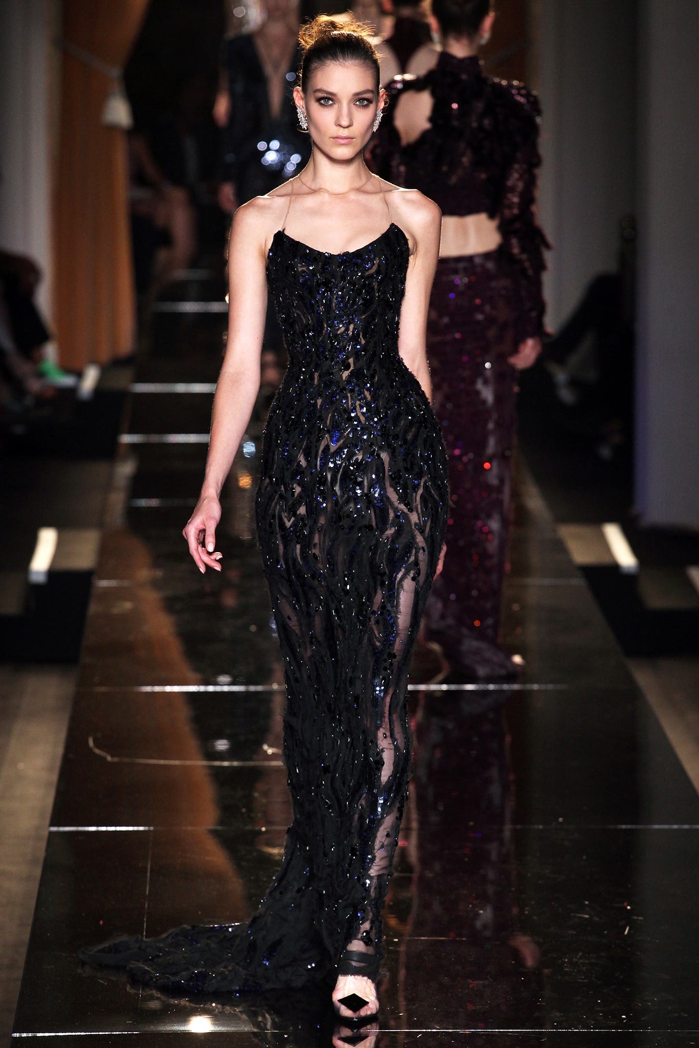 black sequined sleeveless gown