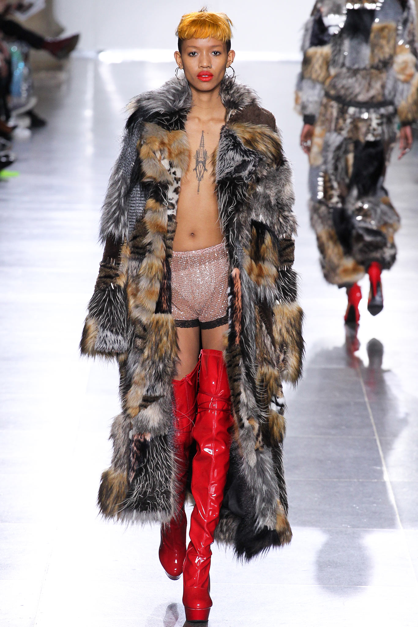 oversized fur coat with sequined shorts
