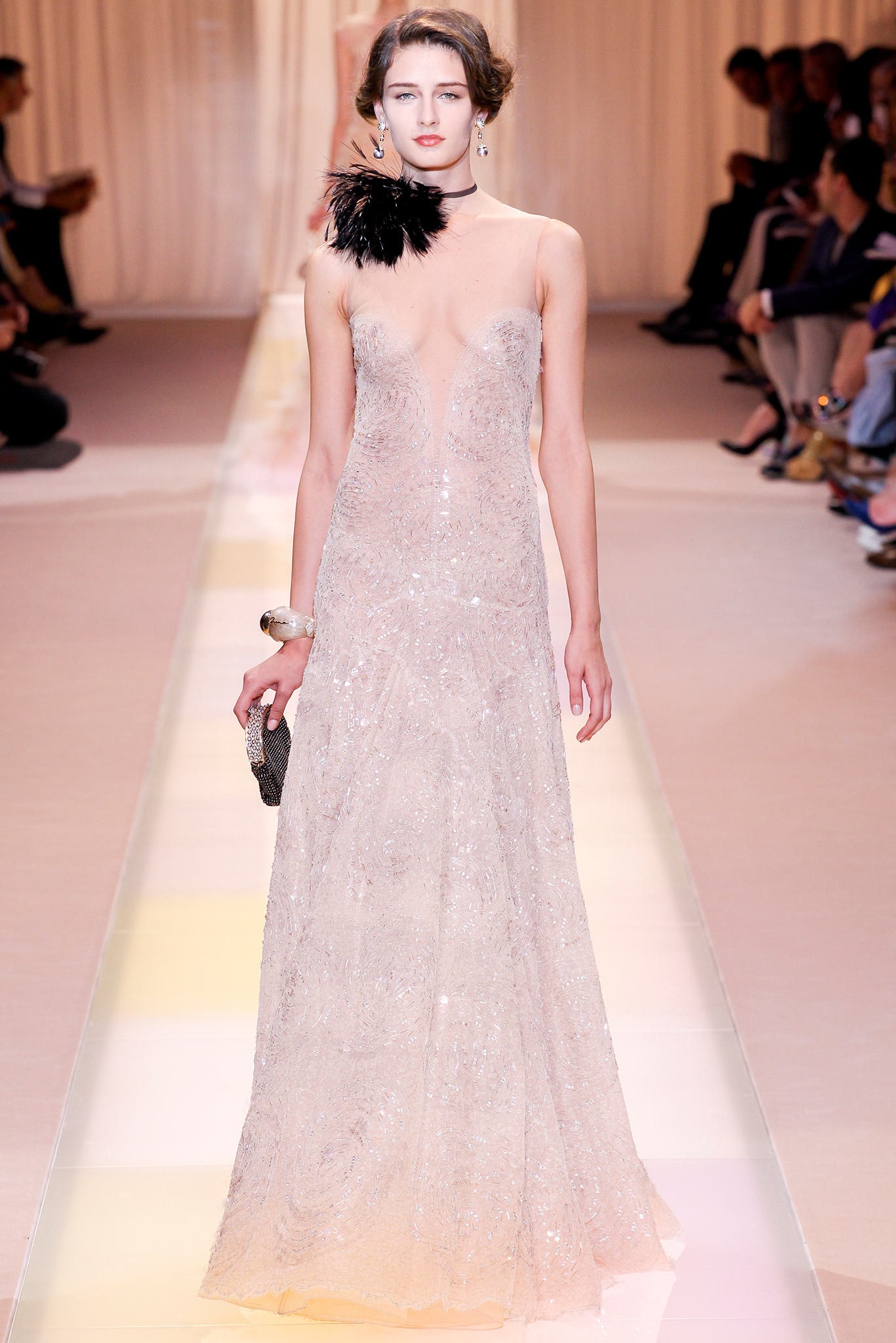 white sequin sleeveless gown