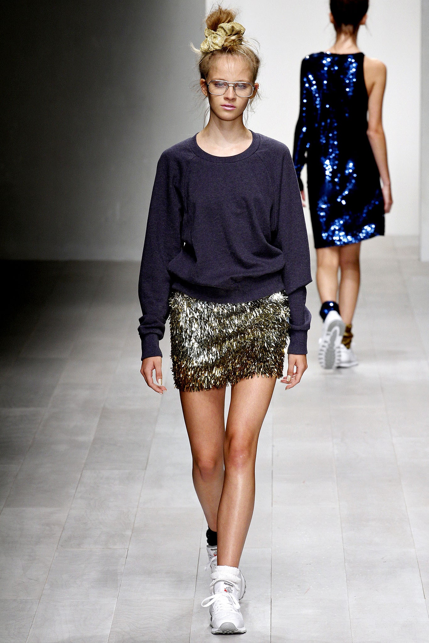 purple relaxed top with gold fringed skirt