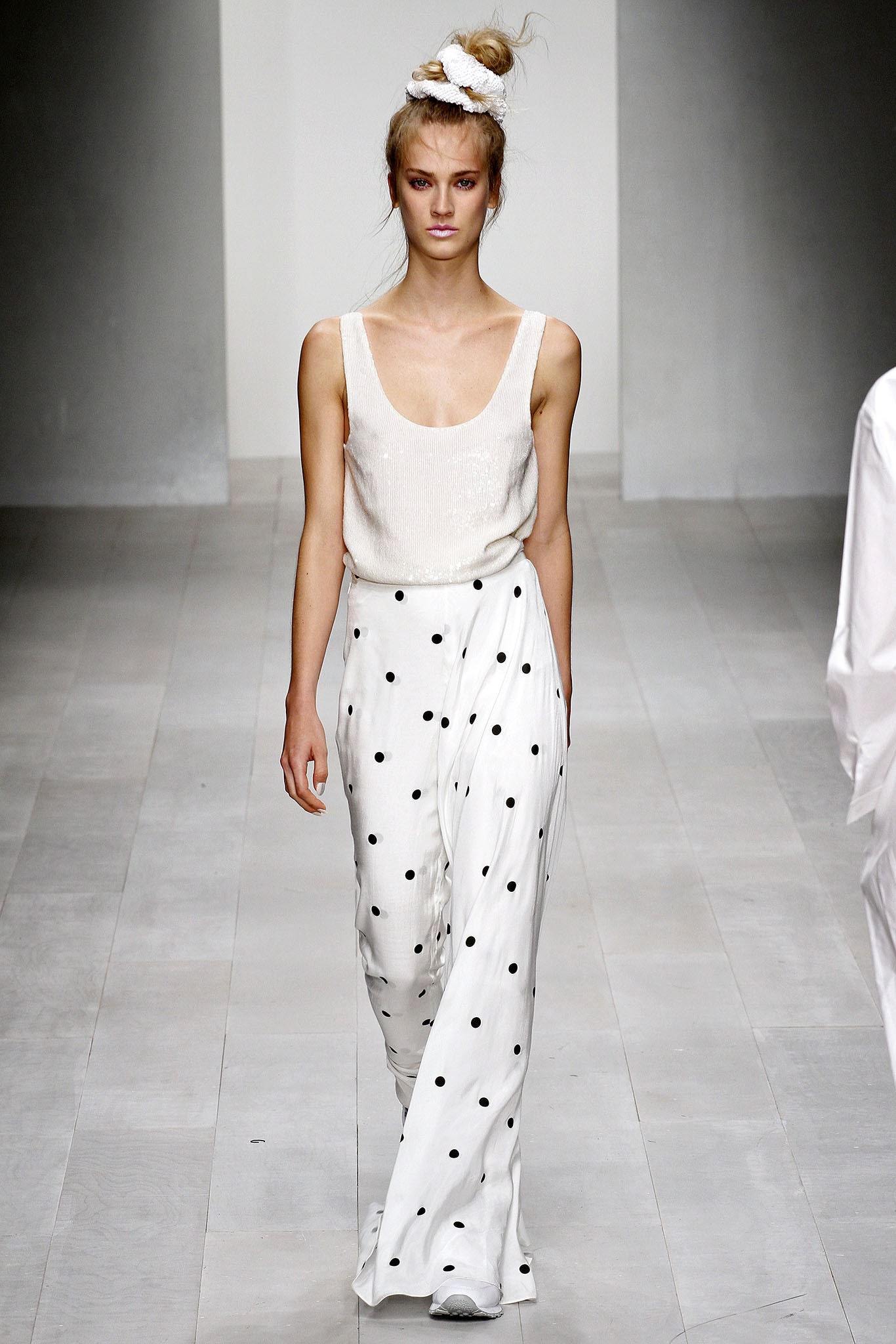white silk top with polka-dot pants