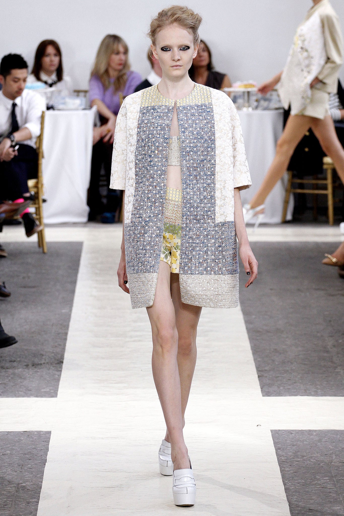 white gray layered coat and yellow dress