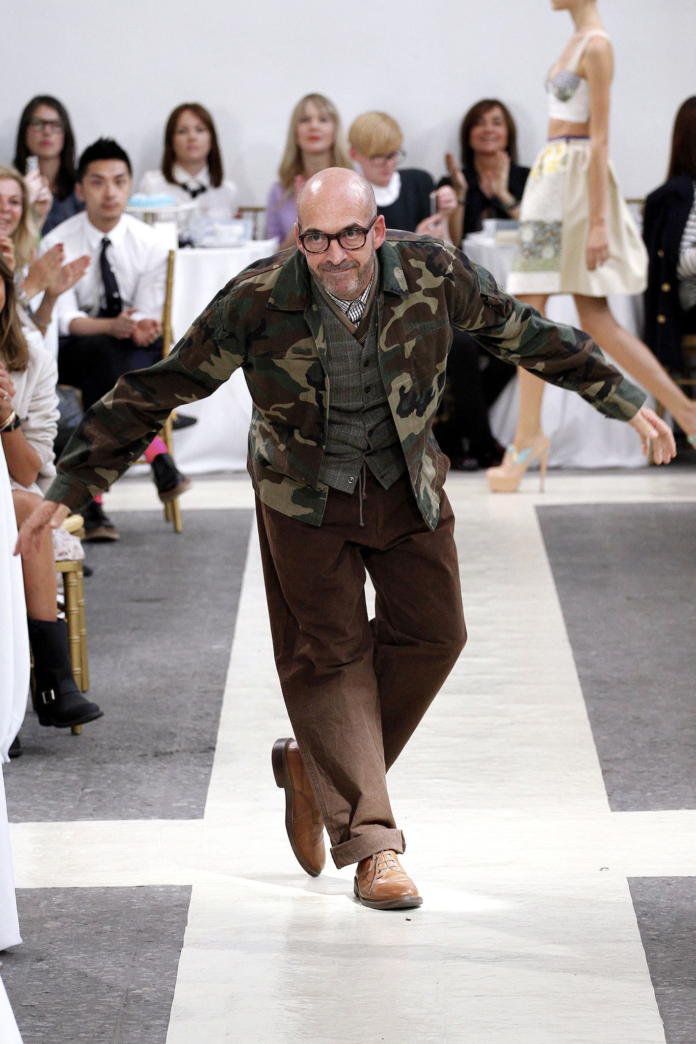 camouflage jacket with brown pants