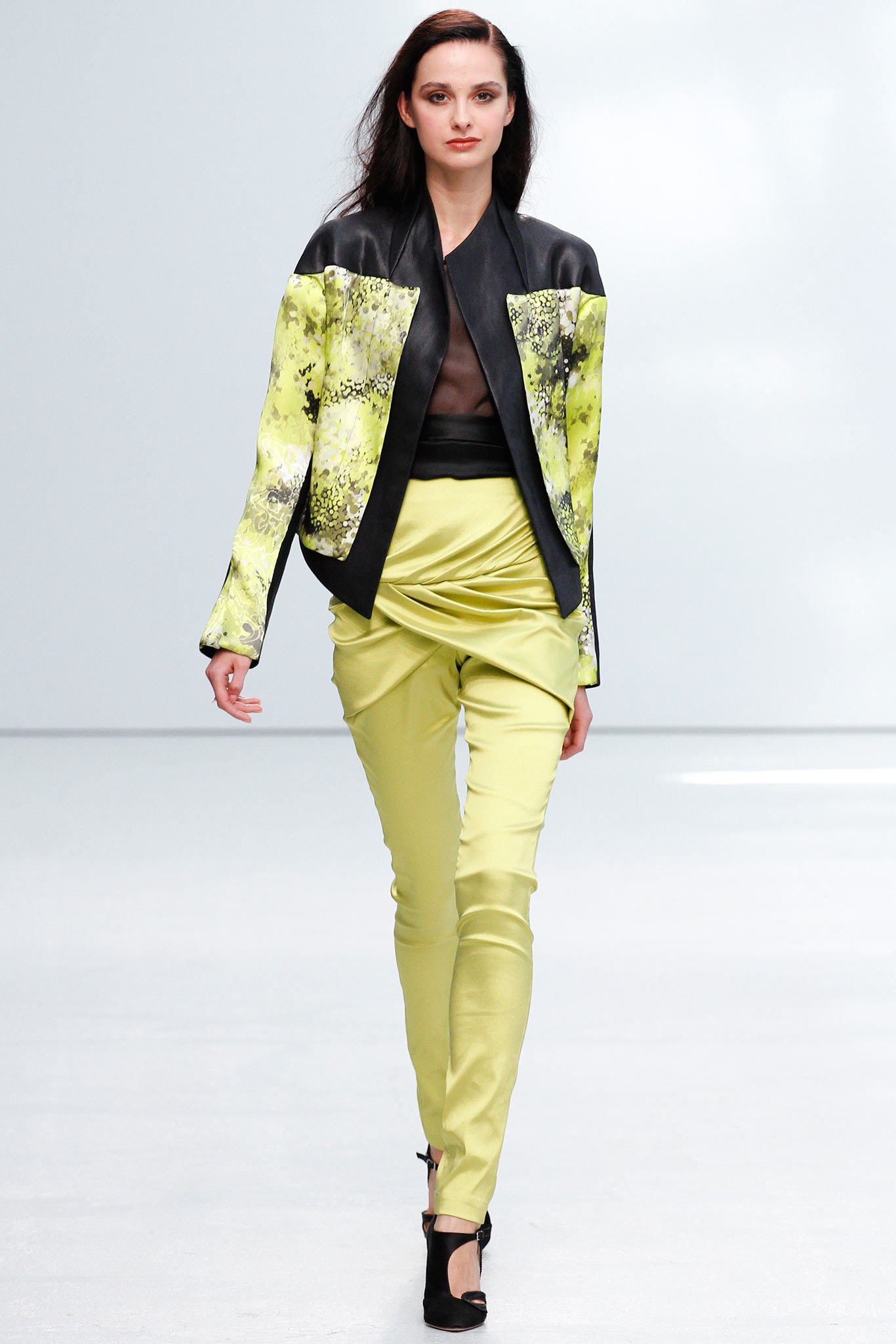 fitted black and yellow jacket with ruched pants