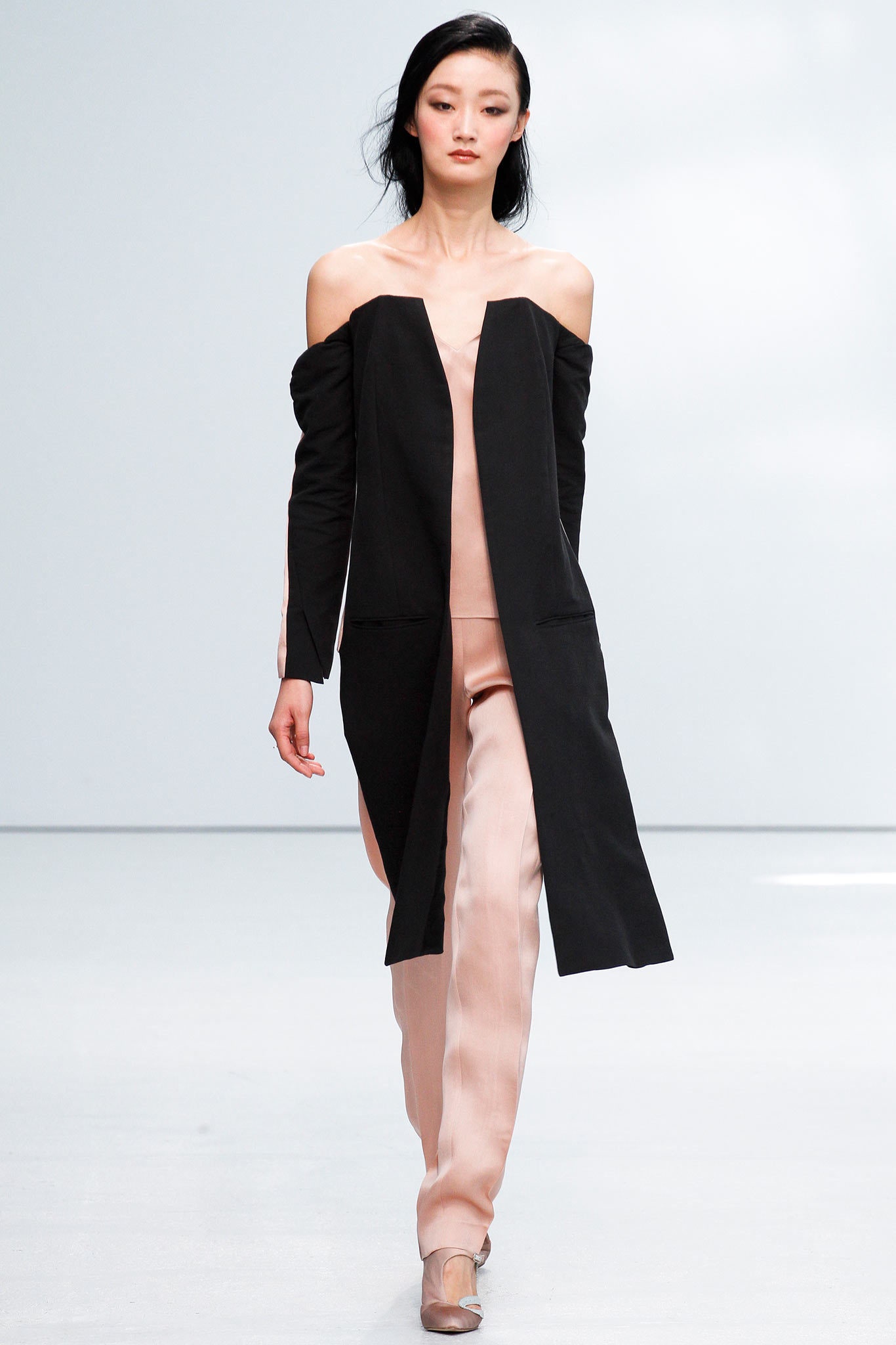 black coat and pink pants