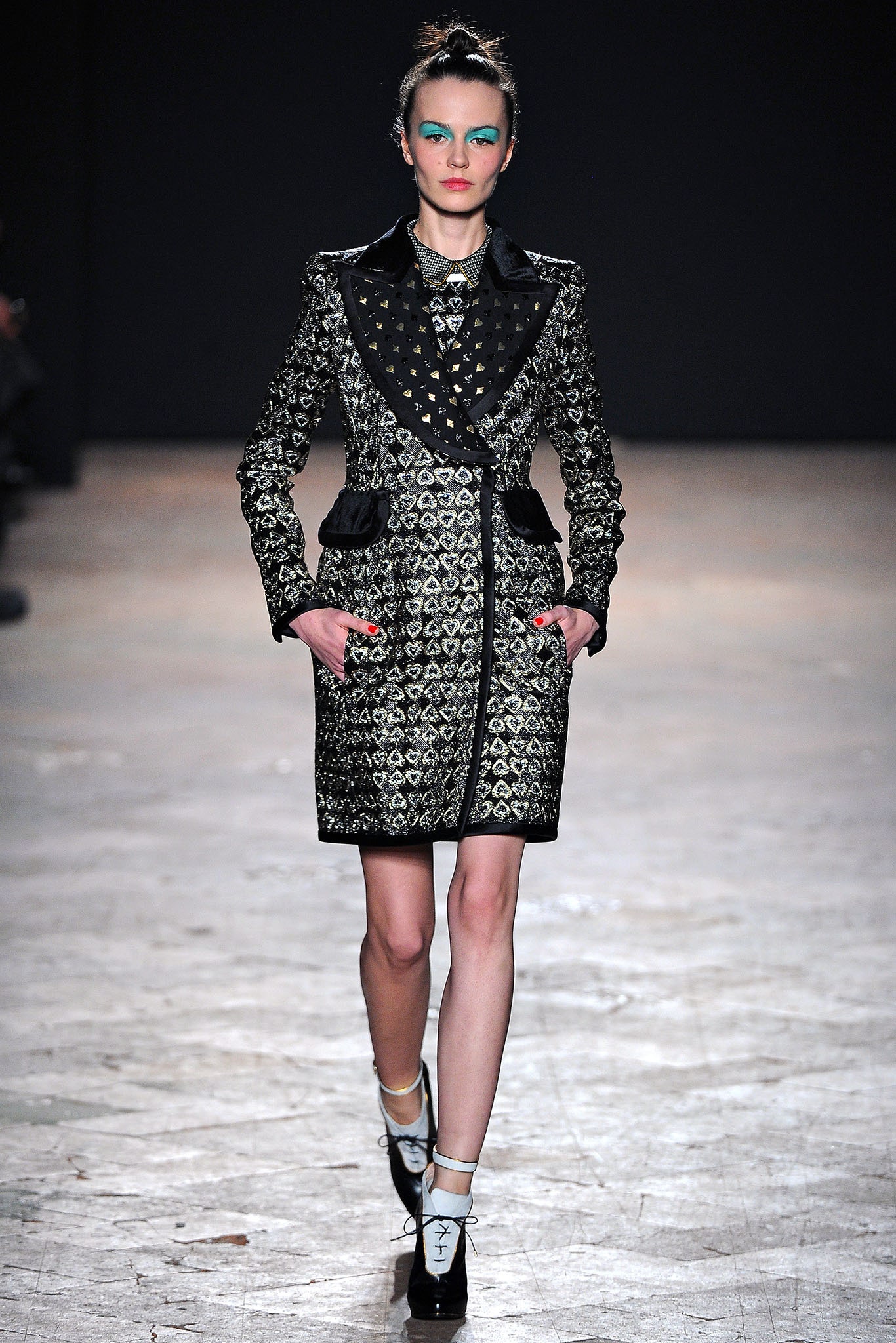 black and gold embroidered coat
