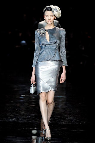 fitted gray silk blouse and silver pencil skirt