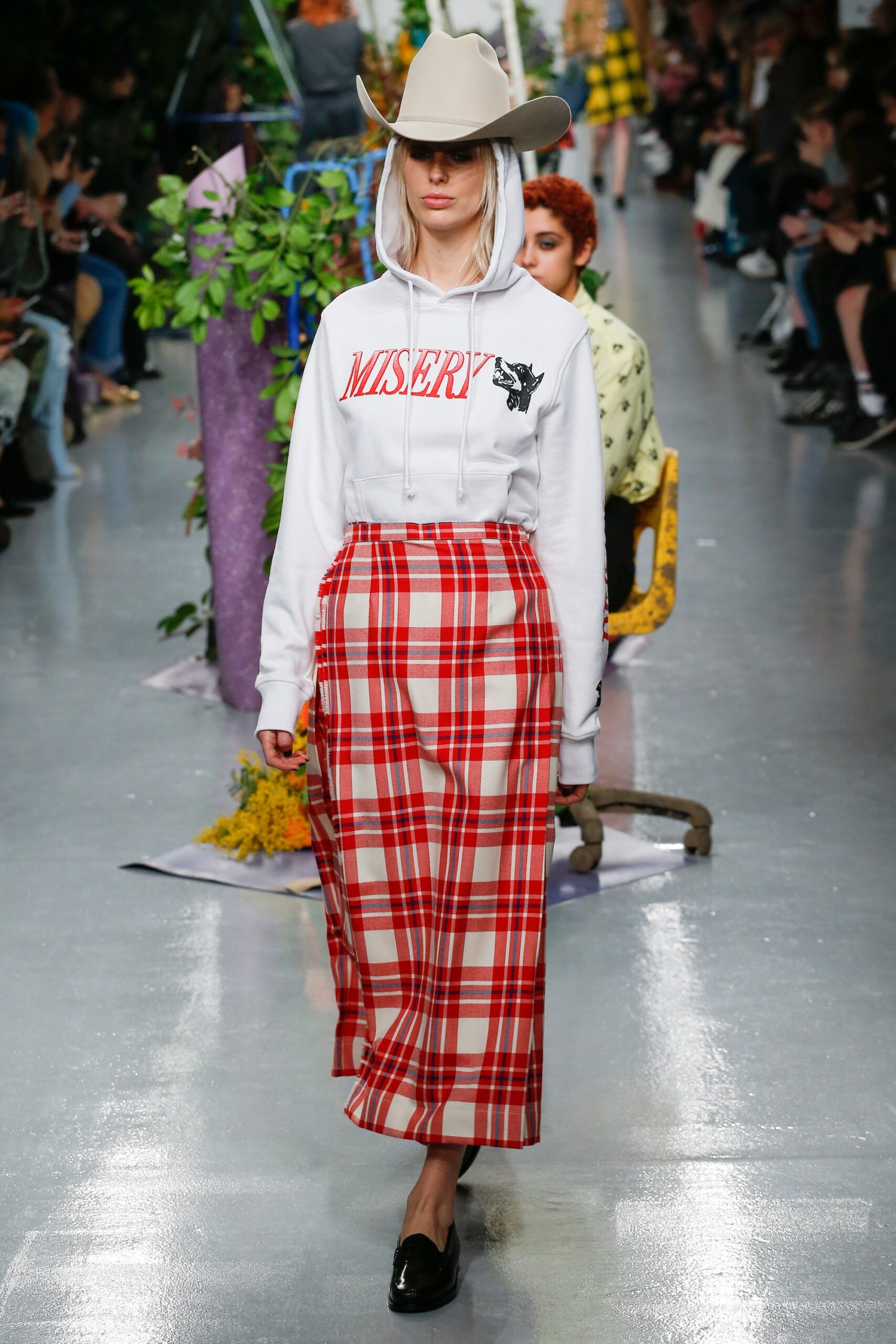 white hoodie with plaid skirt