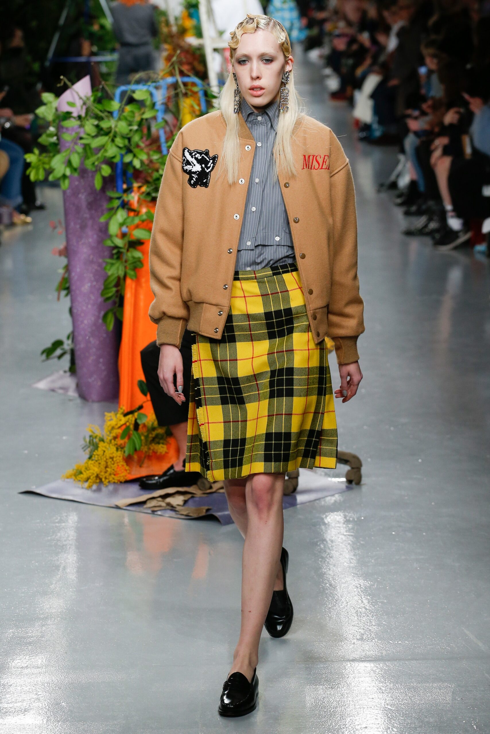 brown relaxed jacket gray shirt yellow plaid skirt