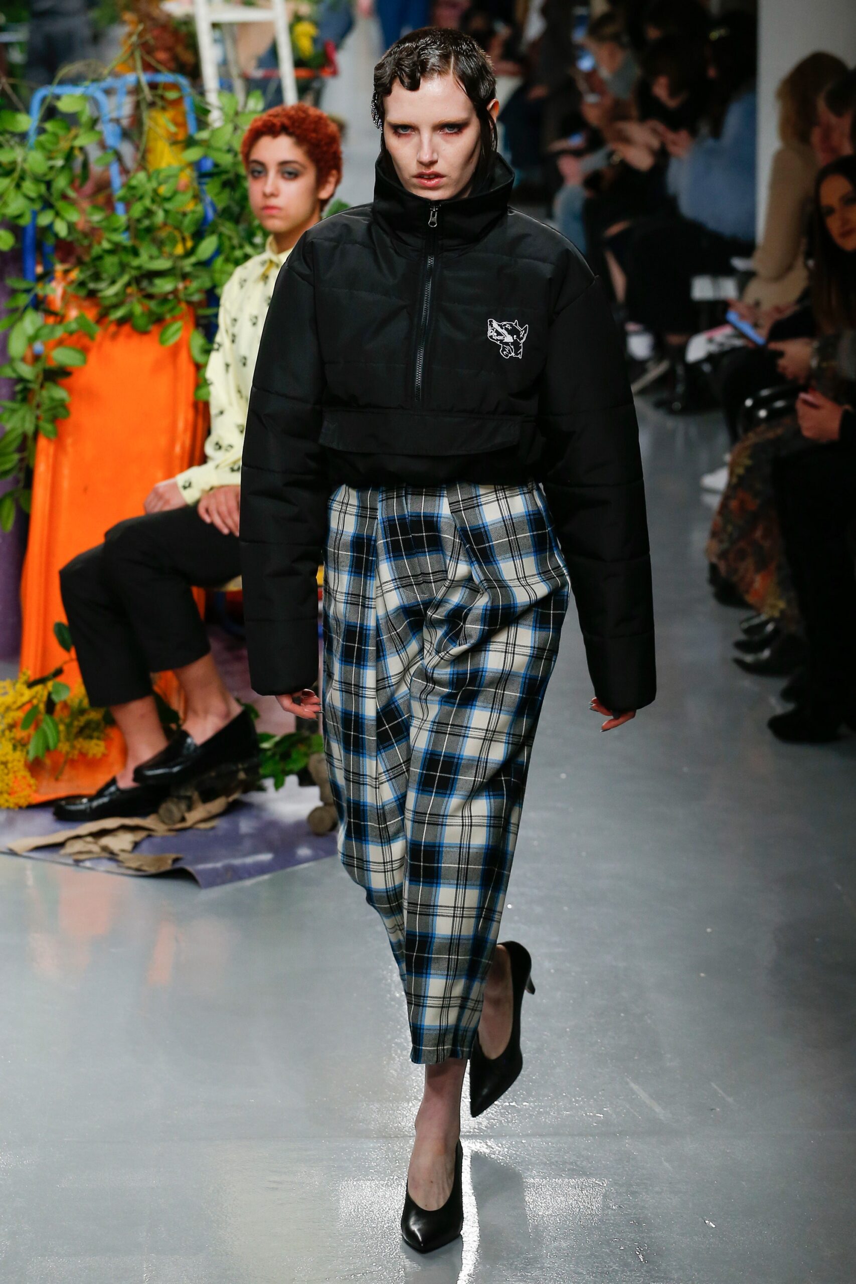black fitted jacket with plaid pants