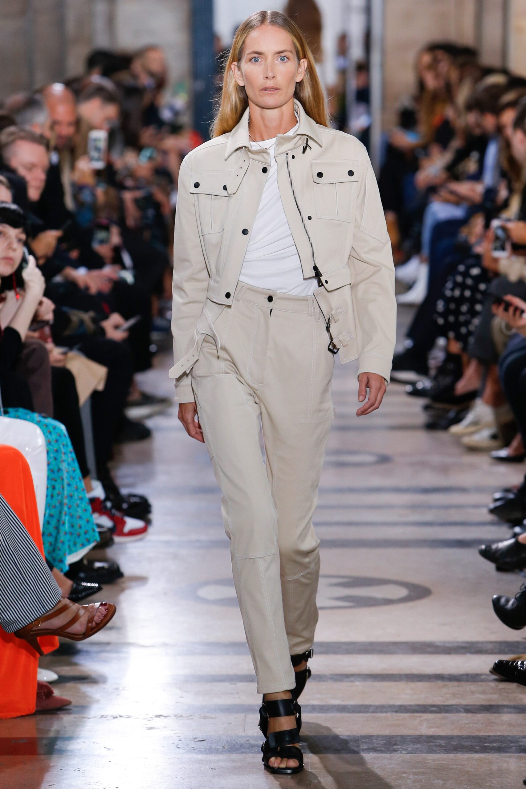beige fitted jacket with white top
