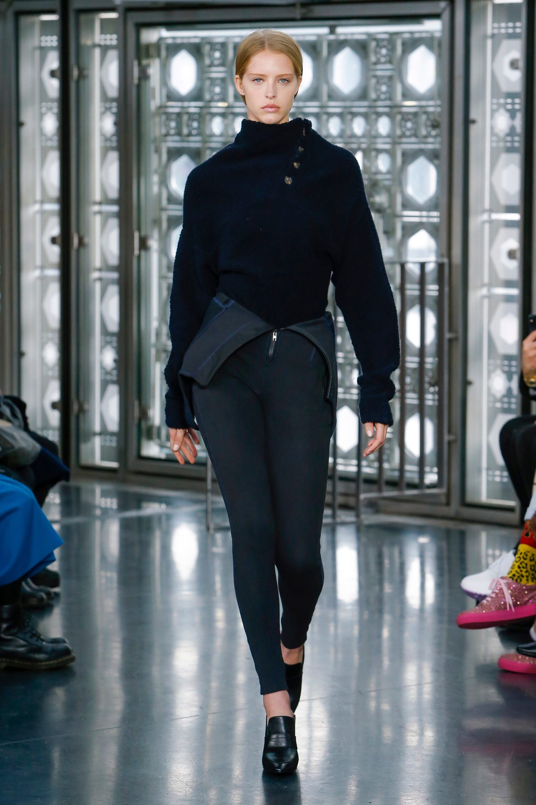 black oversized sweater and fitted pants