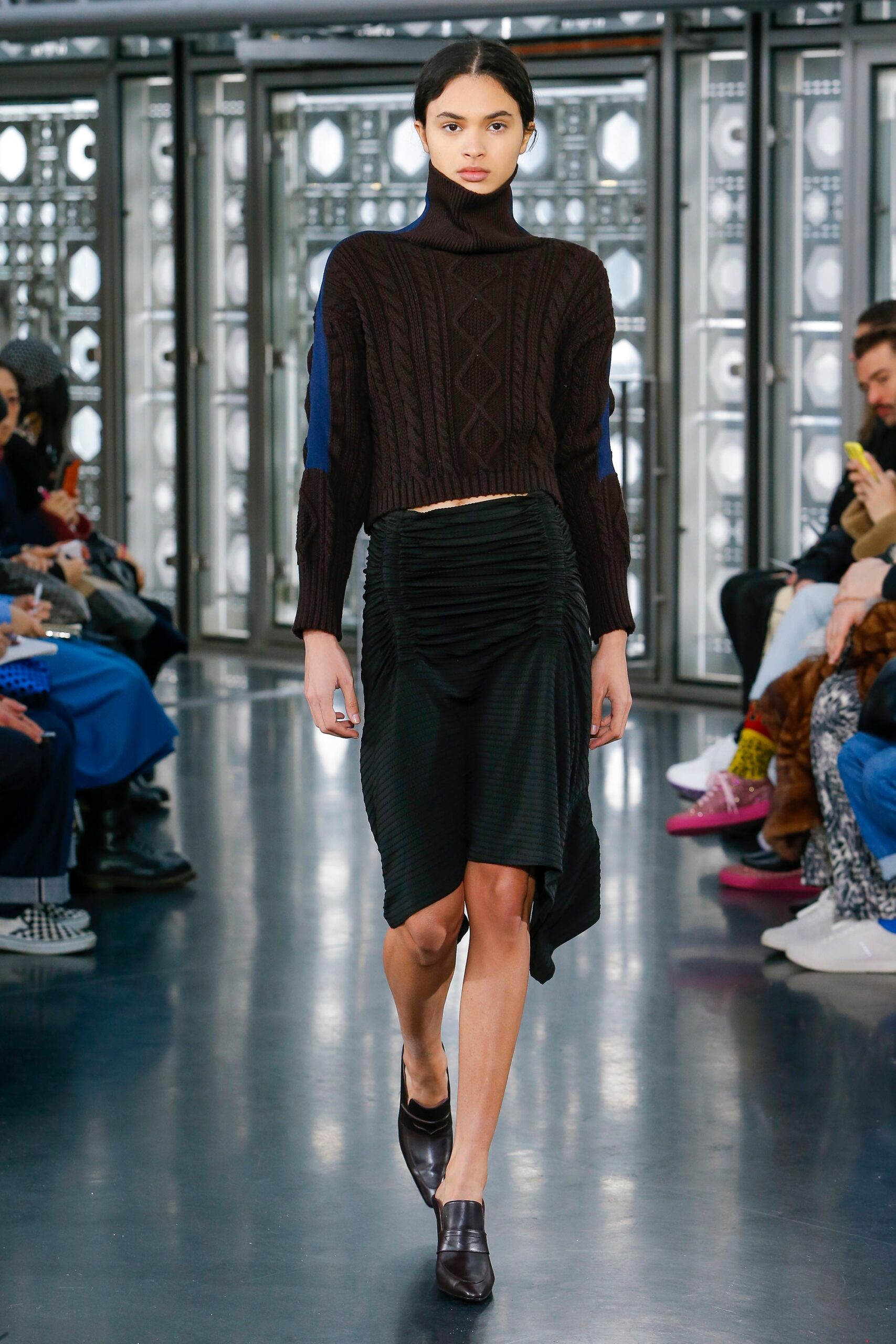 black fitted sweater and skirt