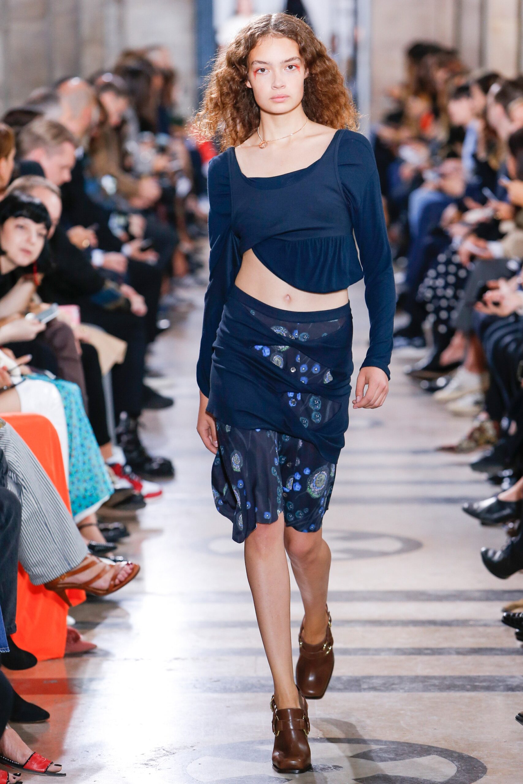 blue fitted top and skirt