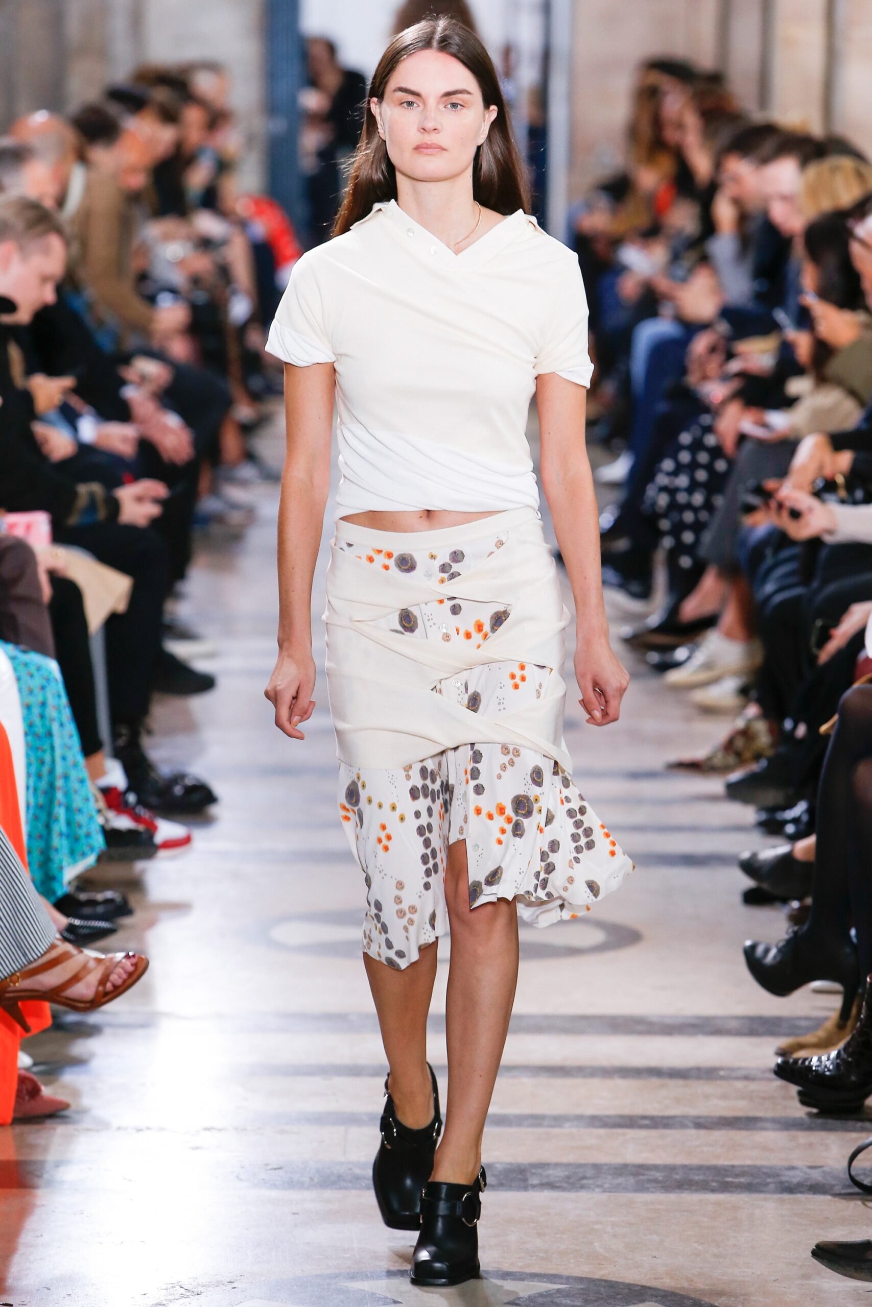 white fitted top with asymmetric skirt