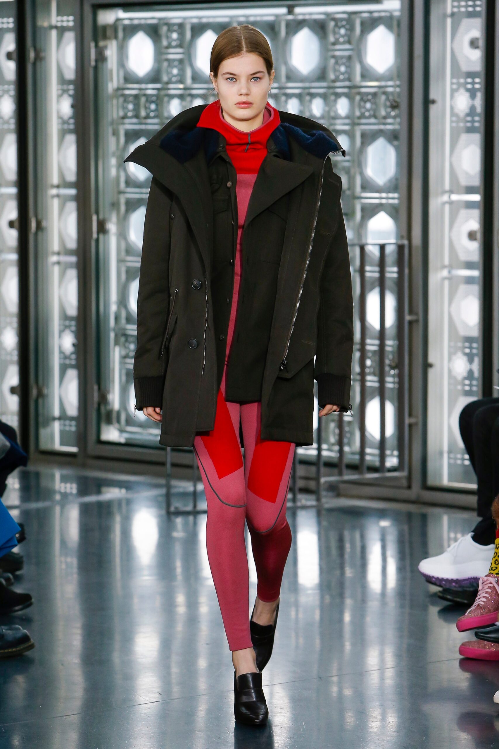 black green coat with red jumpsuit